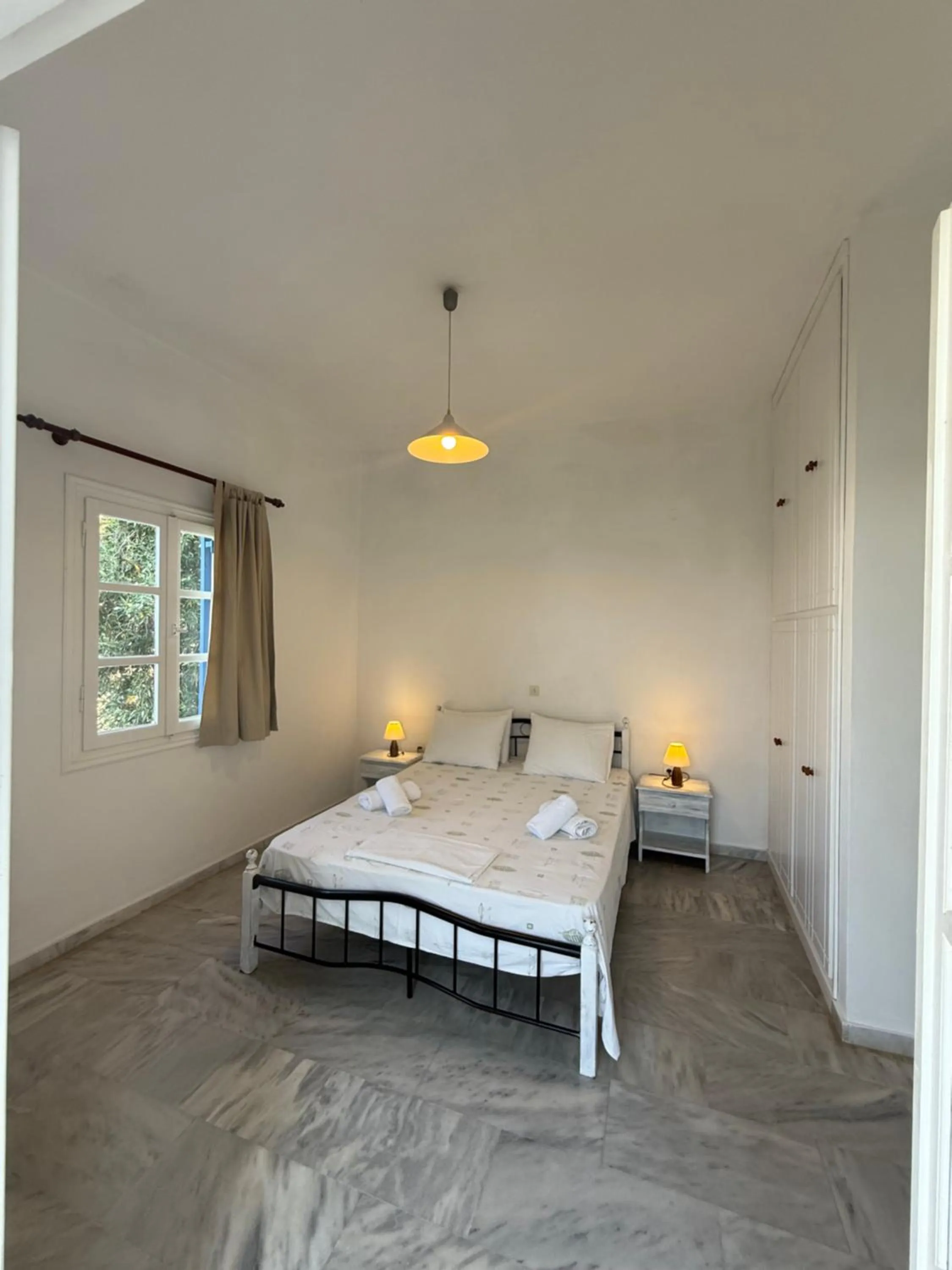 Bed in Kionia Galini Bangalows