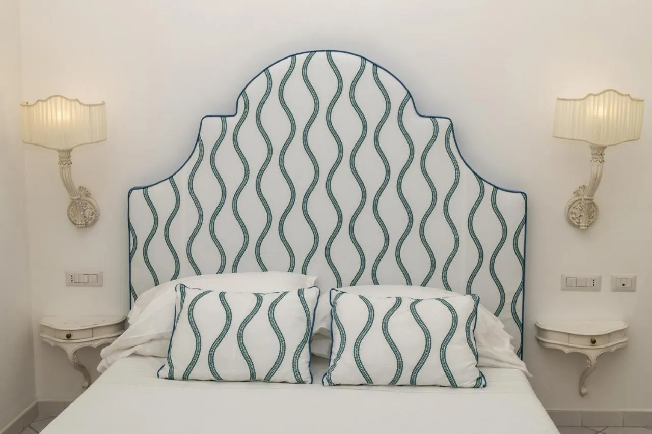 Bed in Hotel Marincanto