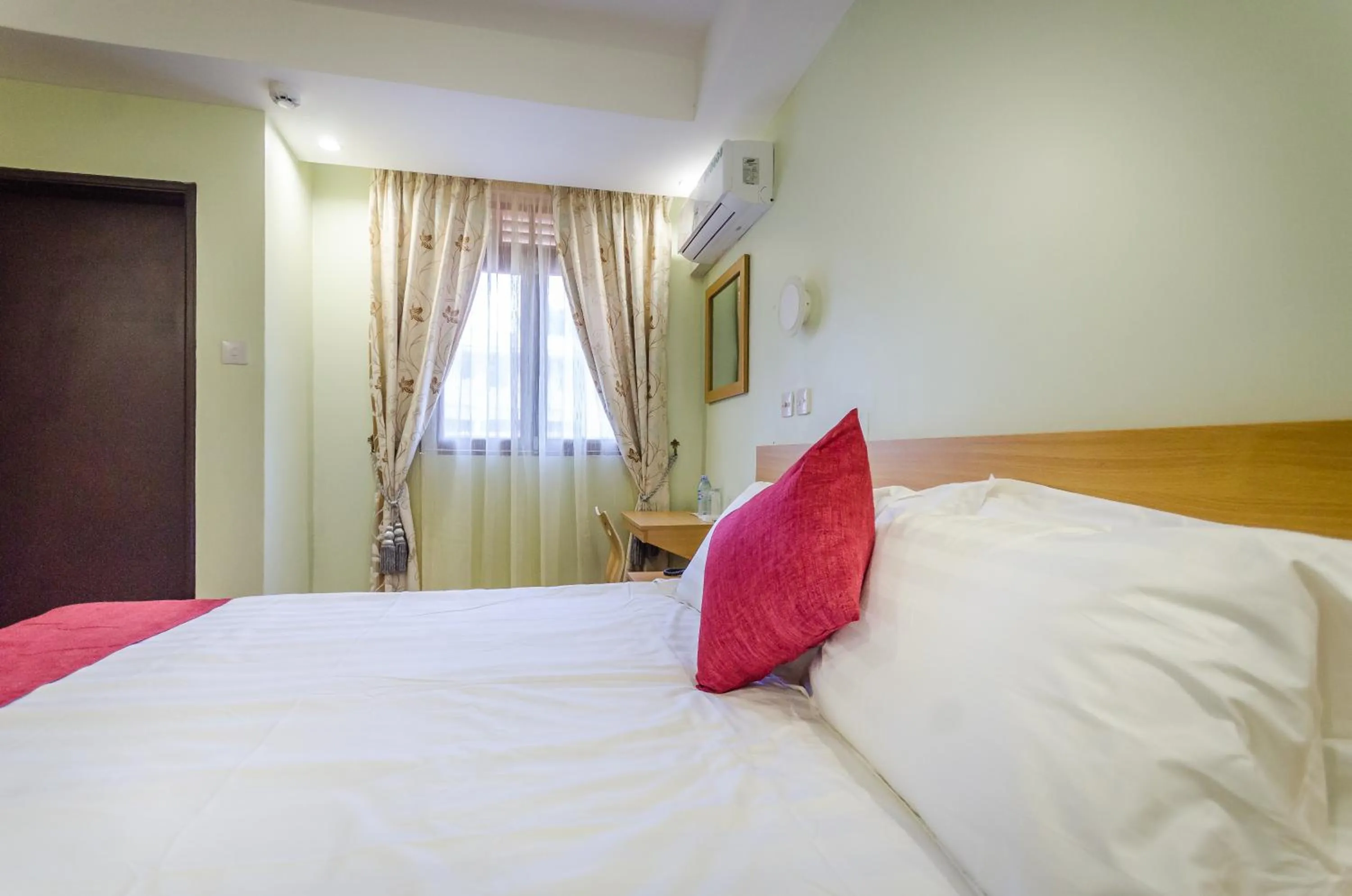 Bed in Nyumbani Hotel