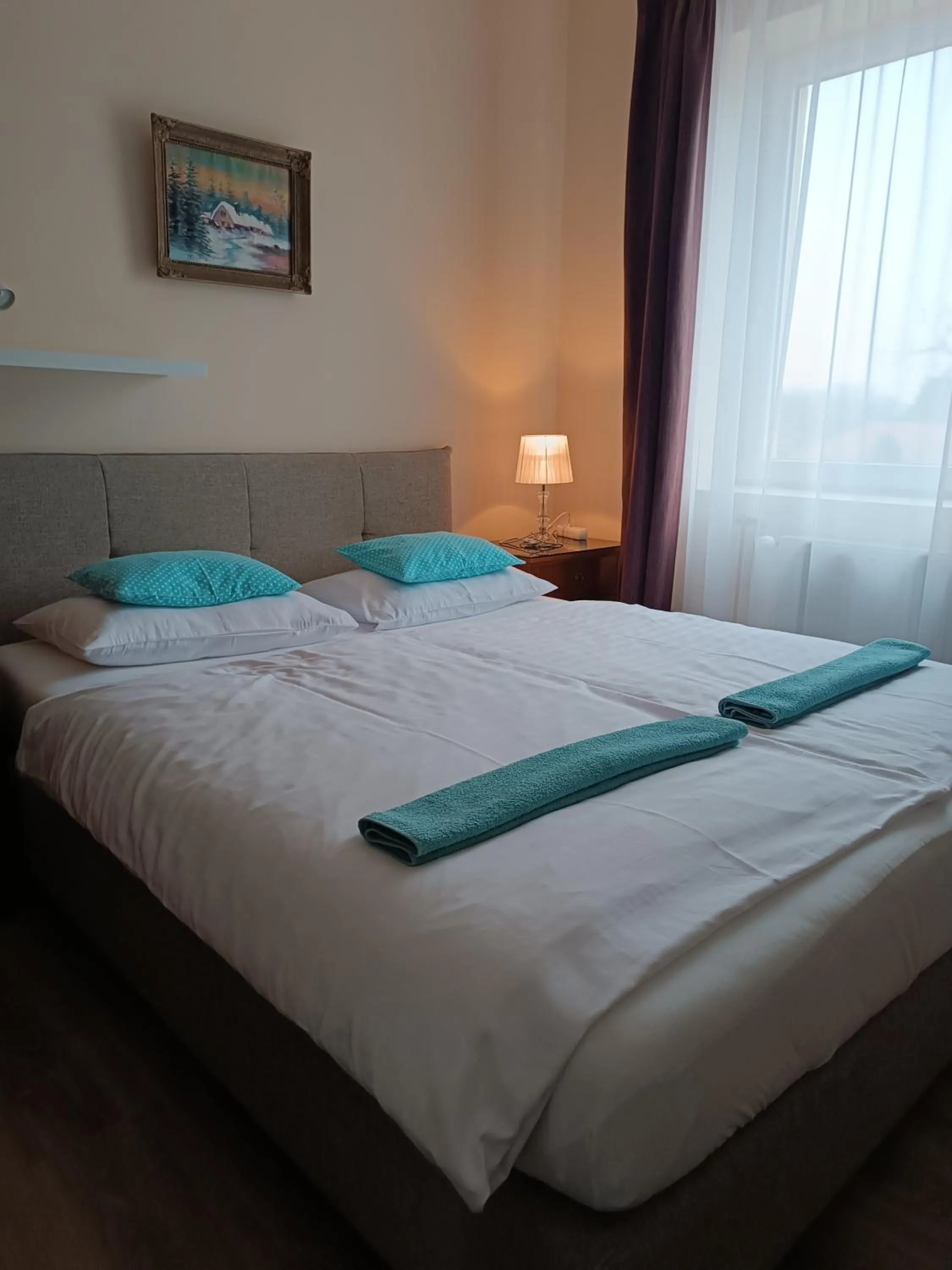 Bed in Szilvia Panzió Gyomaendrőd