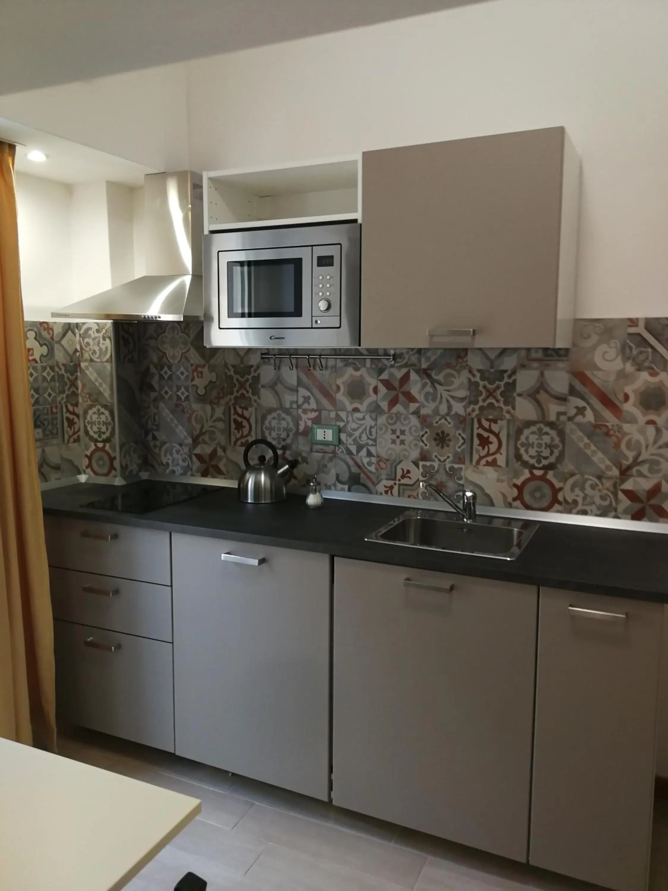 Kitchen or kitchenette in IG-Tysandros Apartments