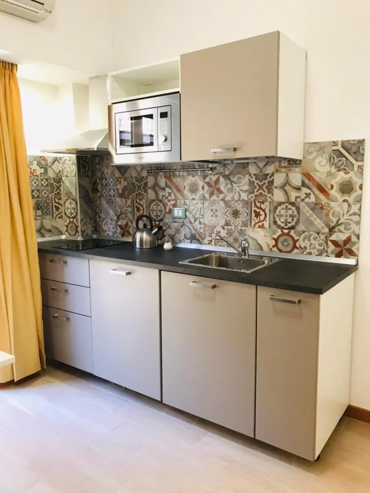 Kitchen or kitchenette in IG-Tysandros Apartments