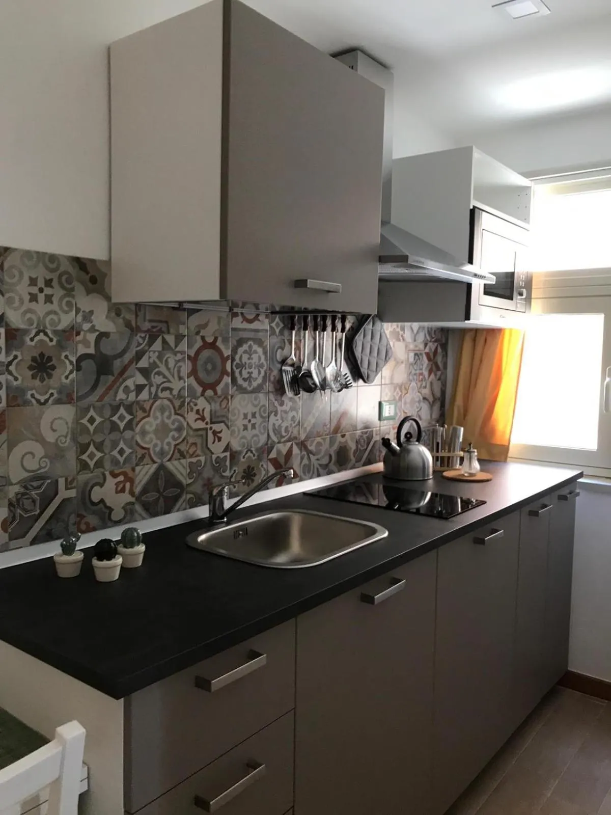 Kitchen or kitchenette in IG-Tysandros Apartments