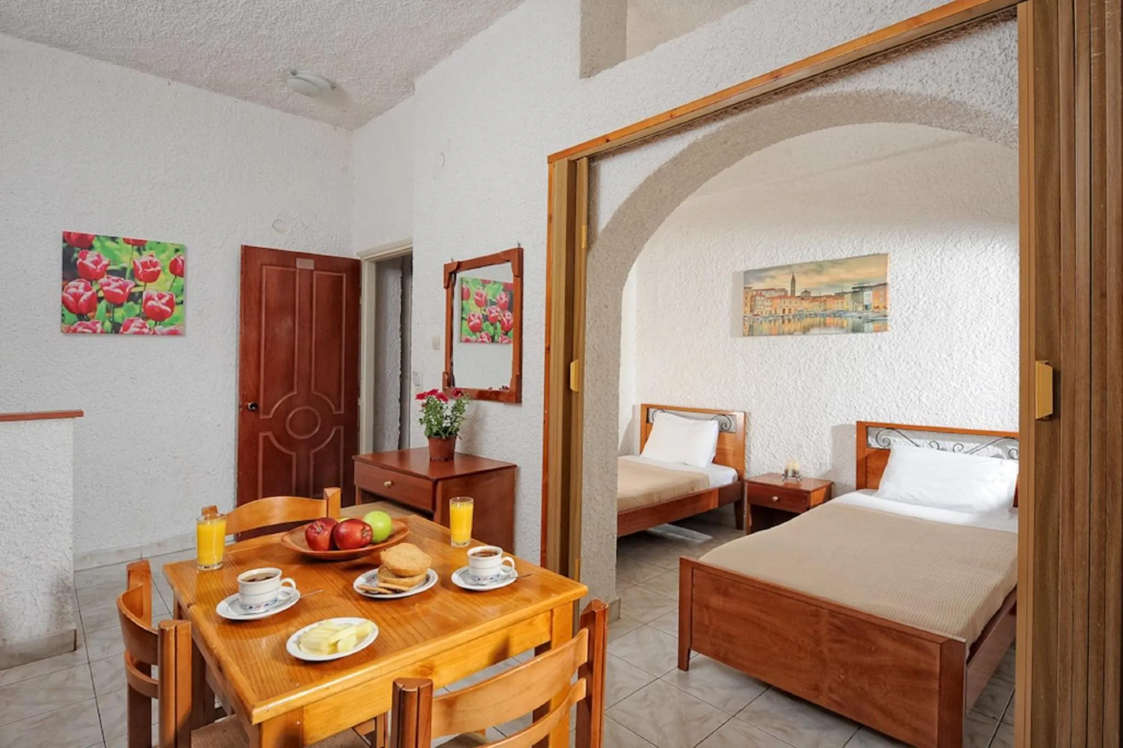 Seating area, Bed in Erofili Apartments