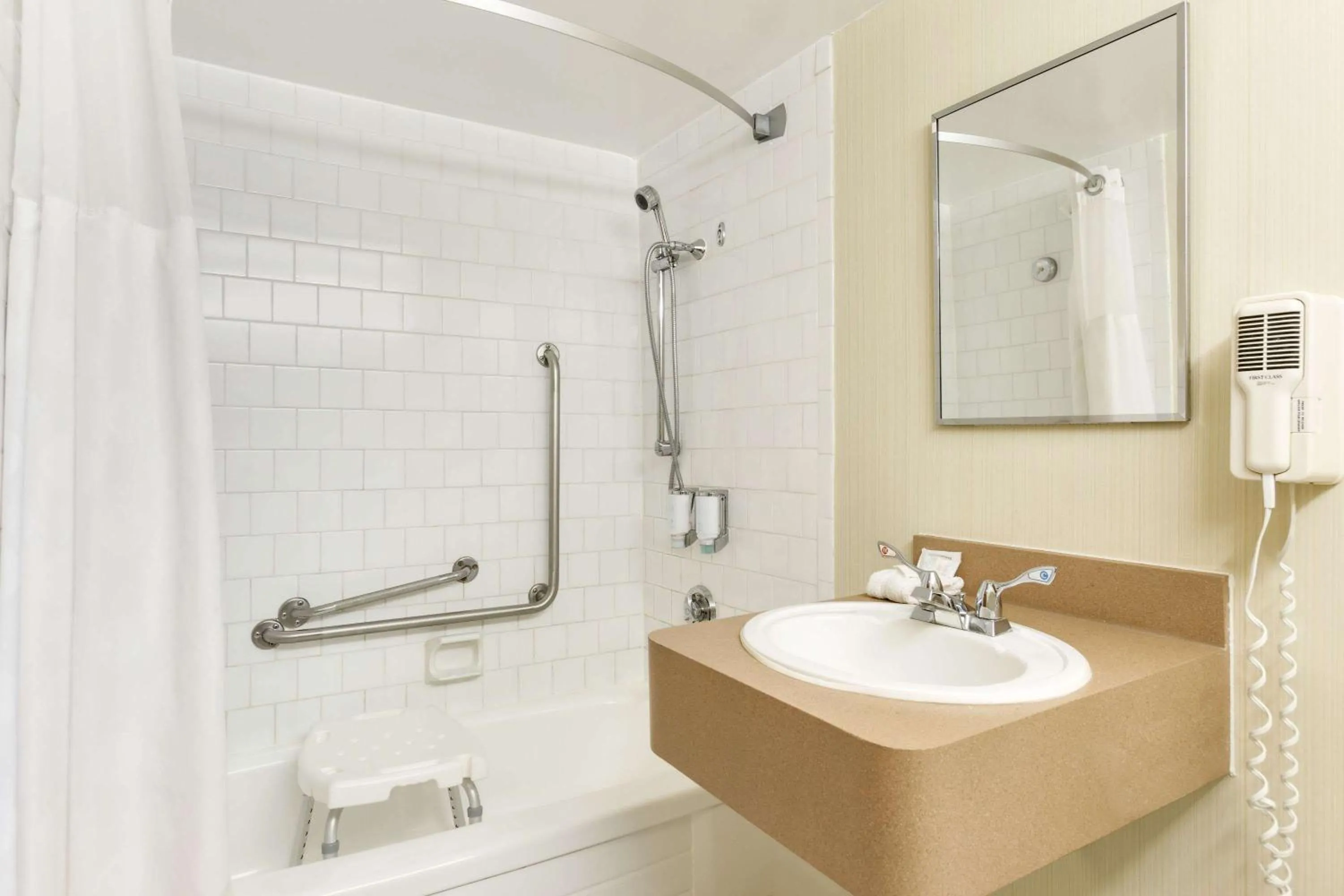 Bathroom in Ramada by Wyndham Belleville Harbourview Conference Center