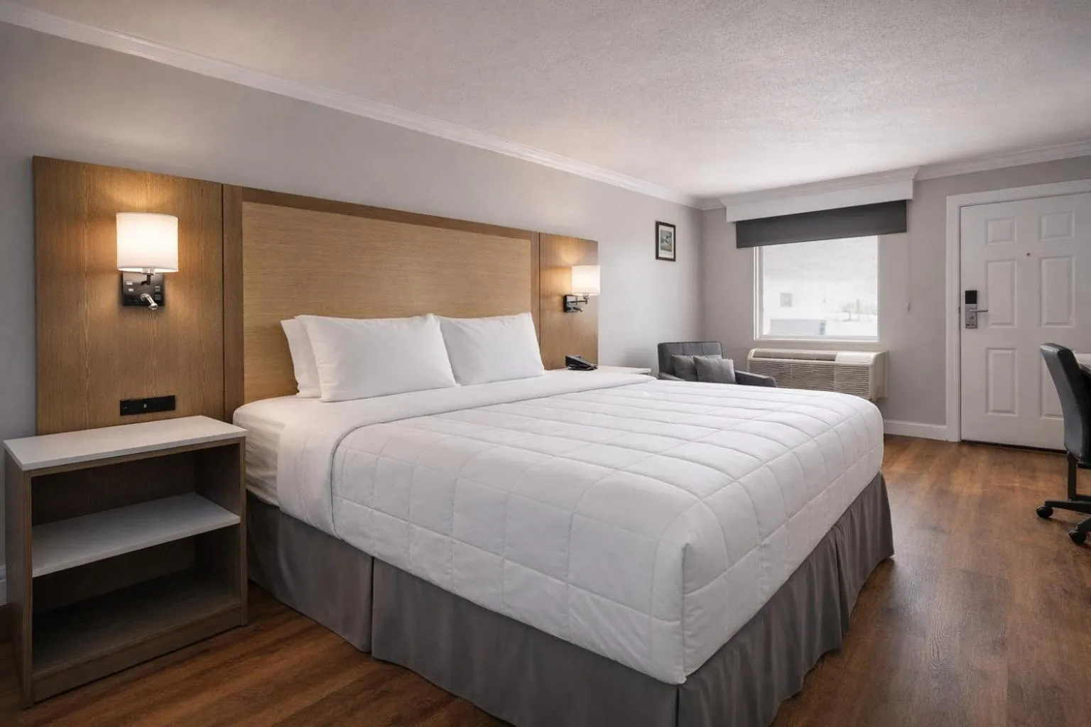 Bed in Destin Inn & Suites