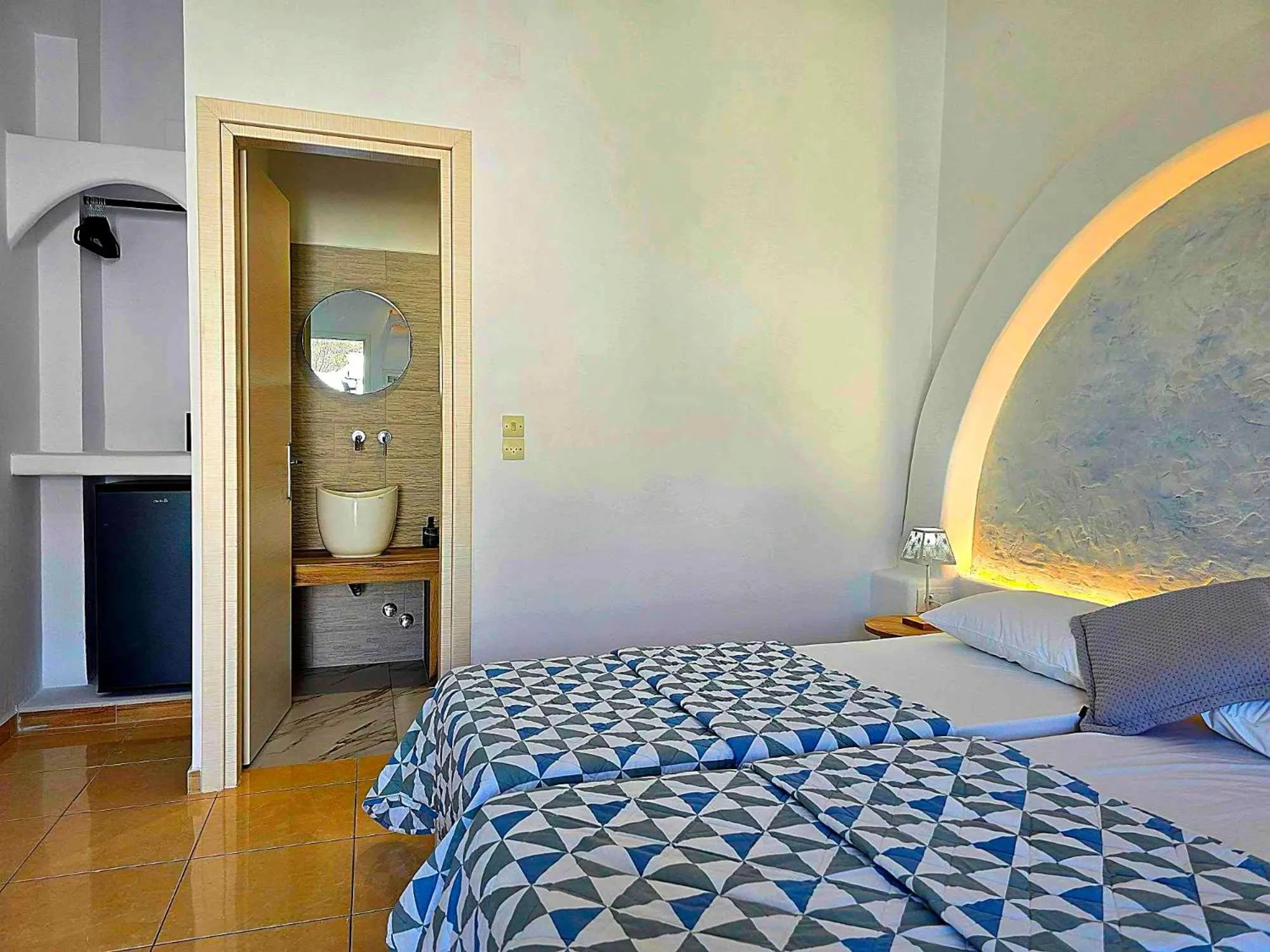 Bed in Papafotis Apartments & Suites