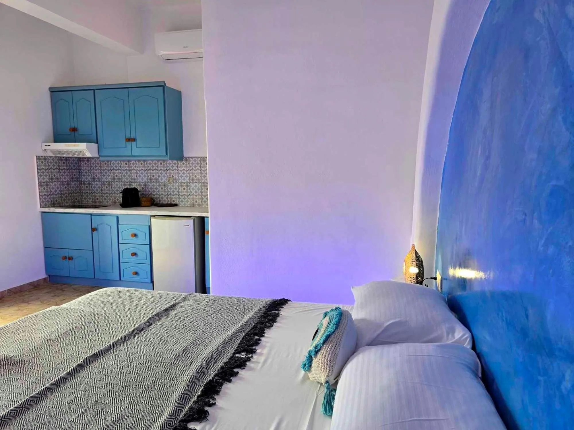 Bed in Papafotis Apartments & Suites