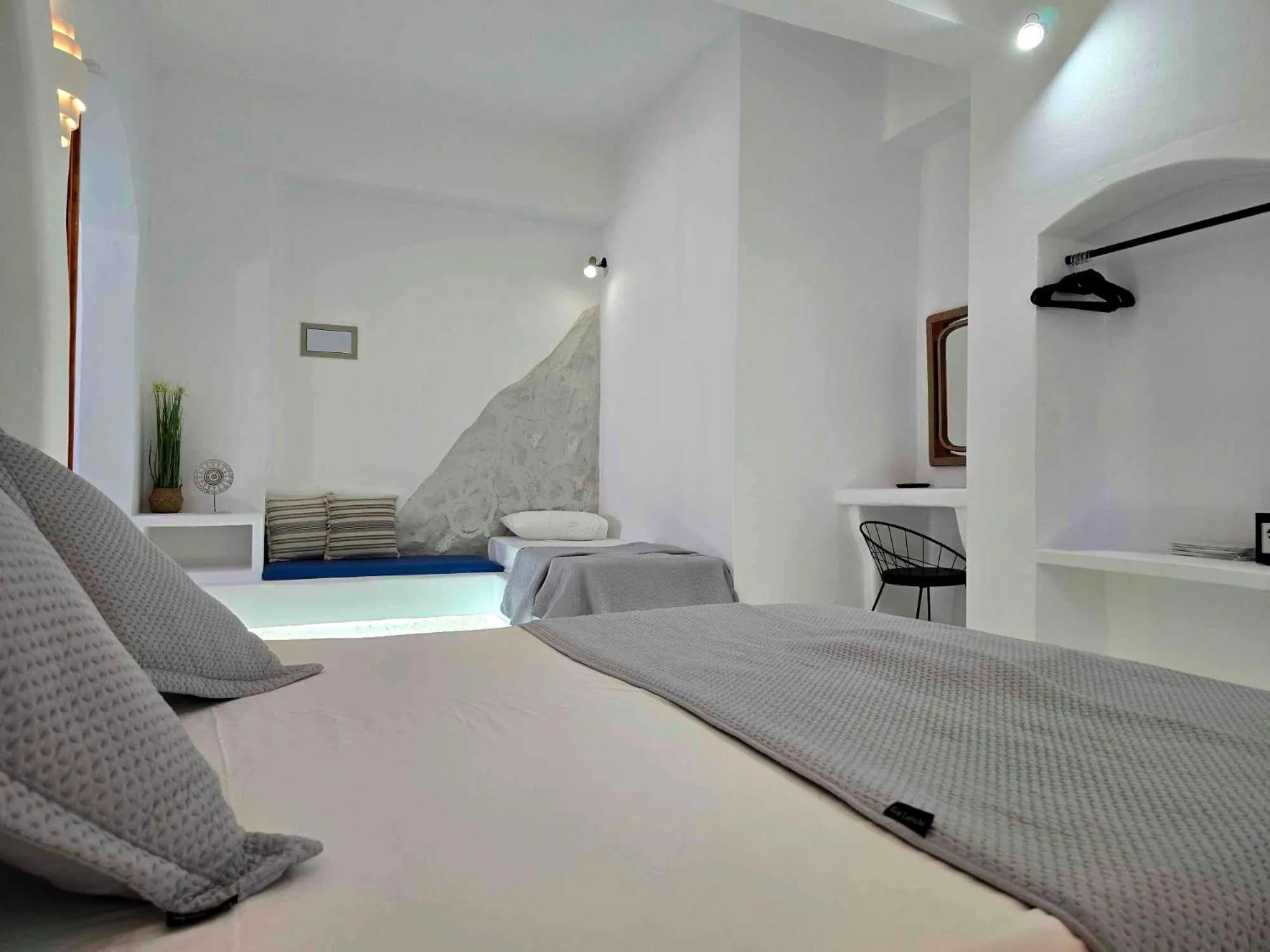 Seating area, Bed in Papafotis Apartments & Suites