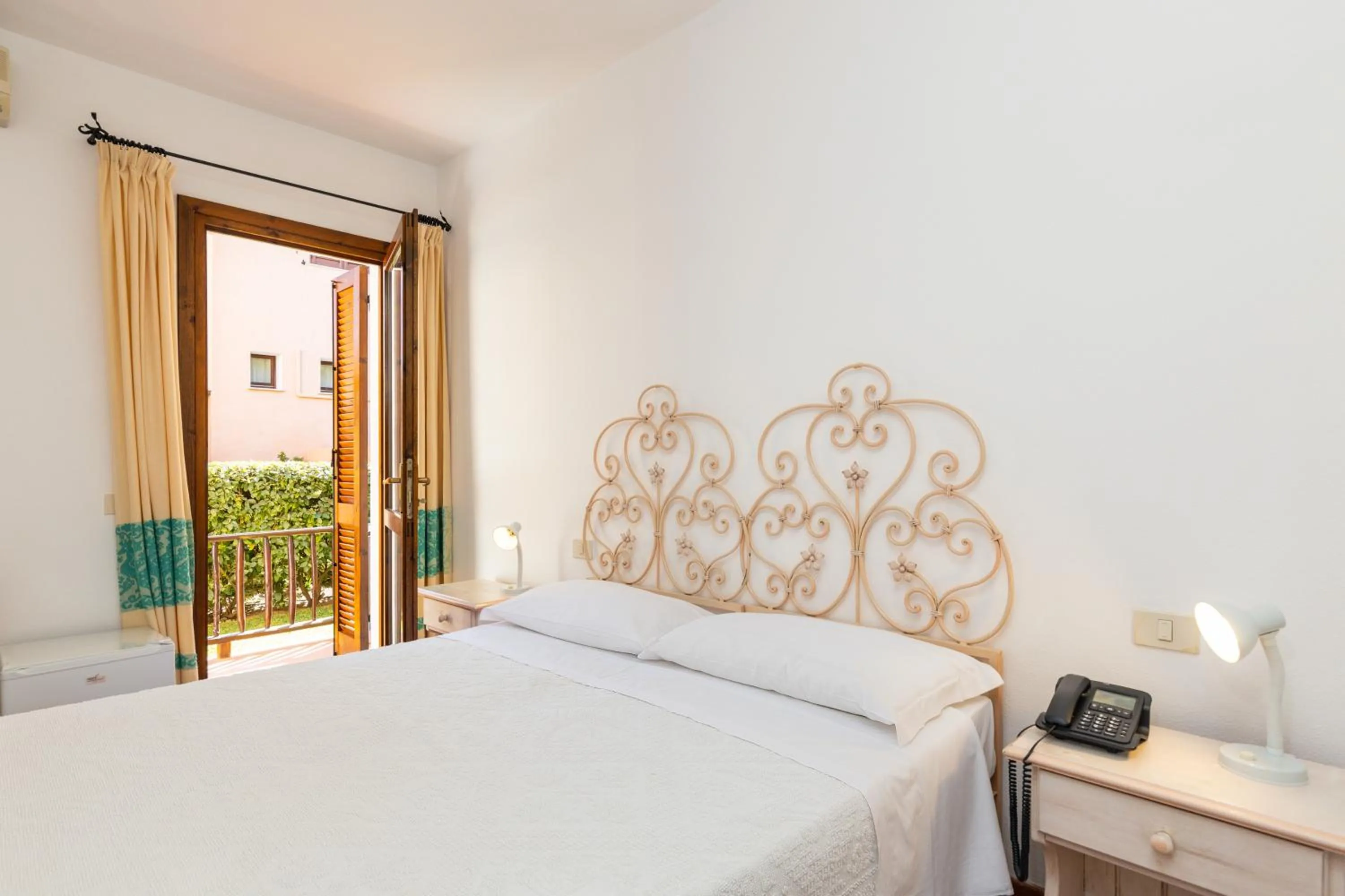 Bed in Hotel Piccolo Pevero