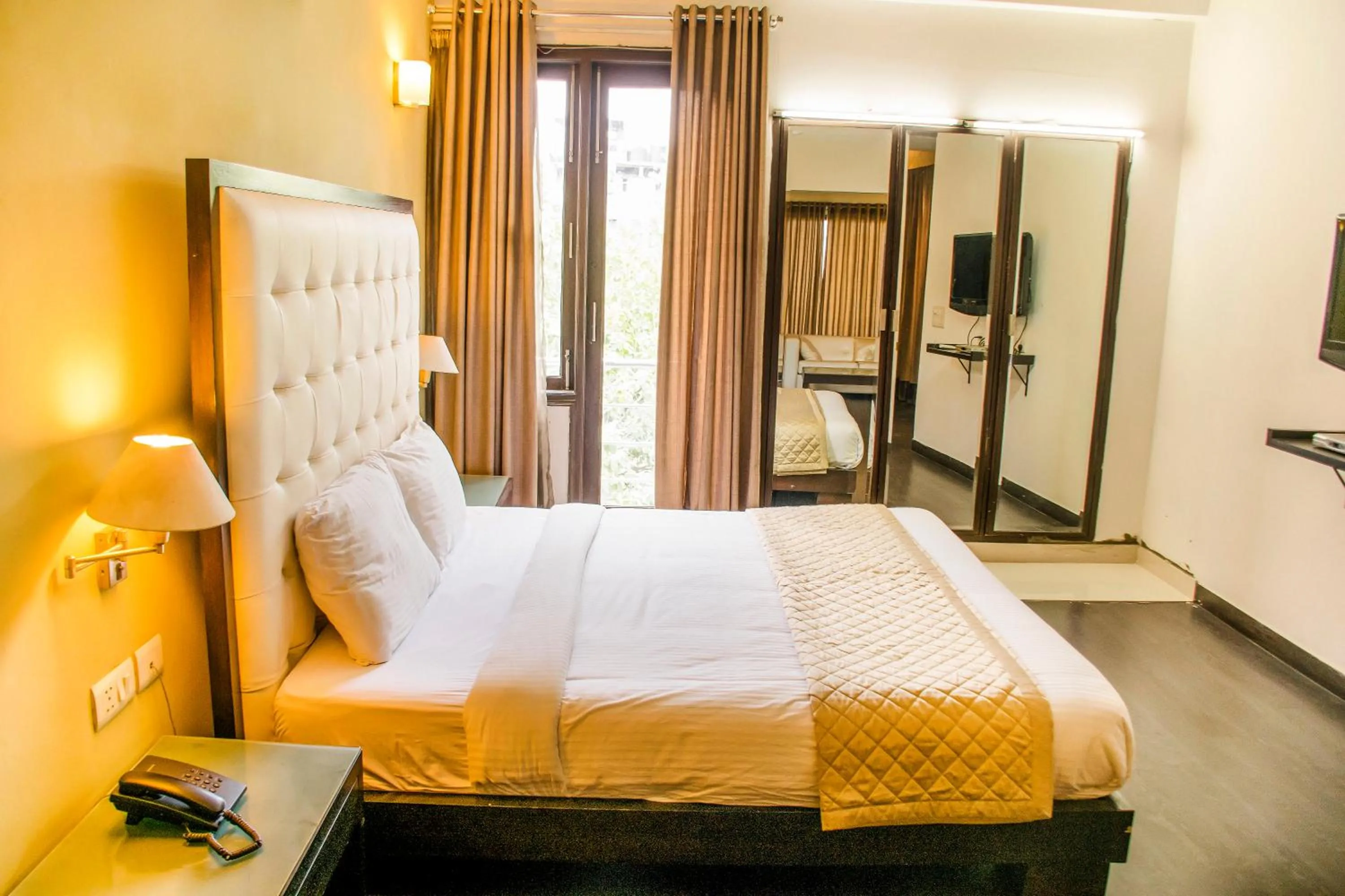 Bed in FabHotel Anutham Saket