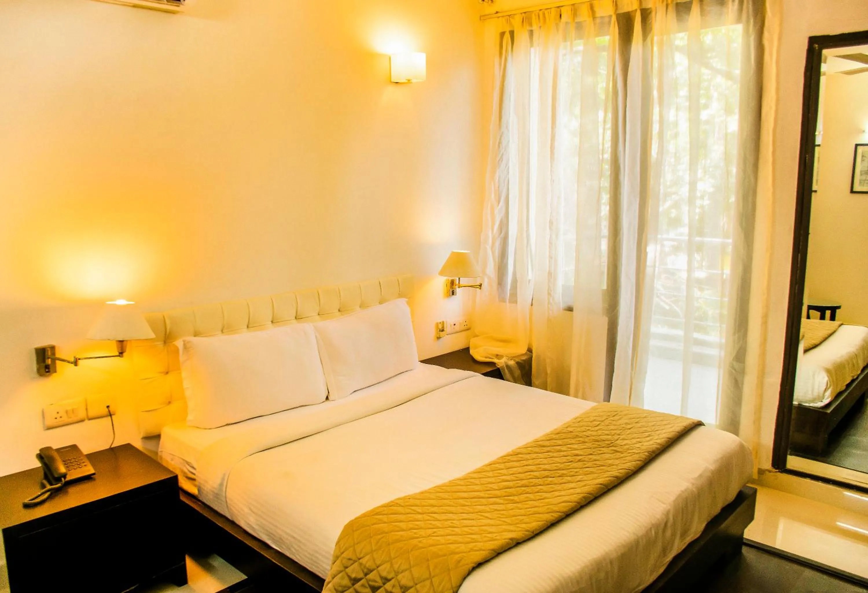 Bed in FabHotel Anutham Saket