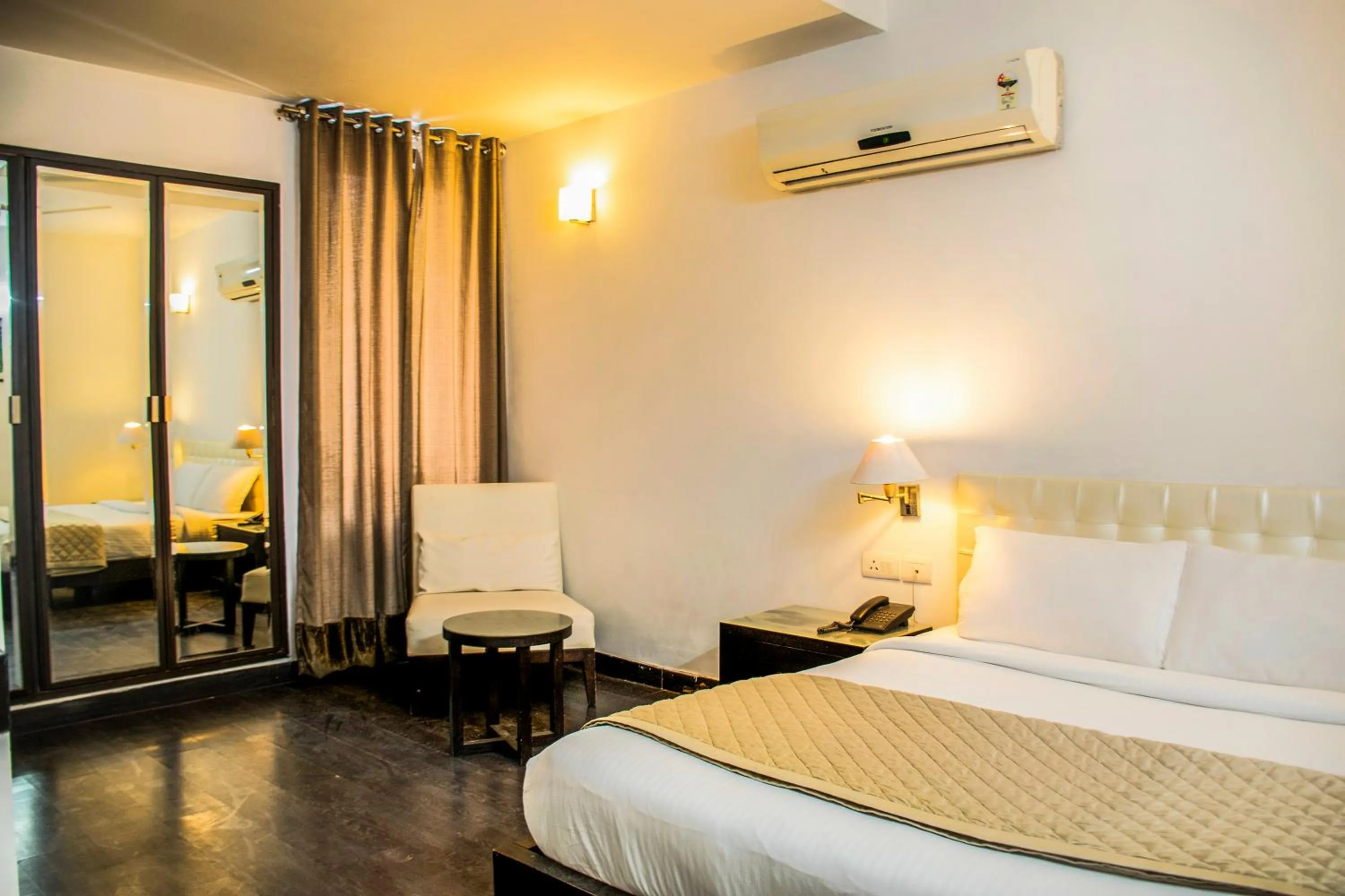 Bed in FabHotel Anutham Saket