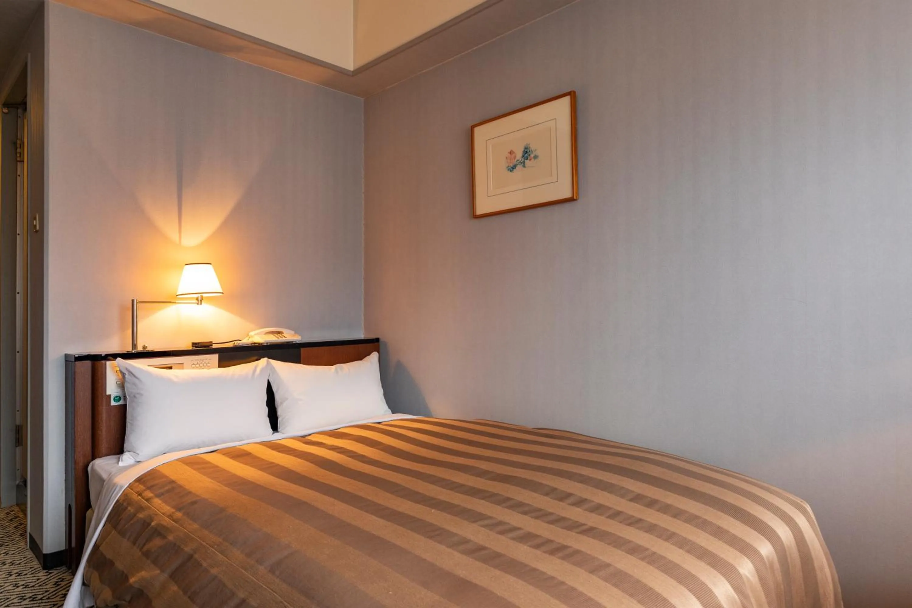 Bed in Ark Hotel Kumamotojo Mae -ROUTE INN HOTELS-