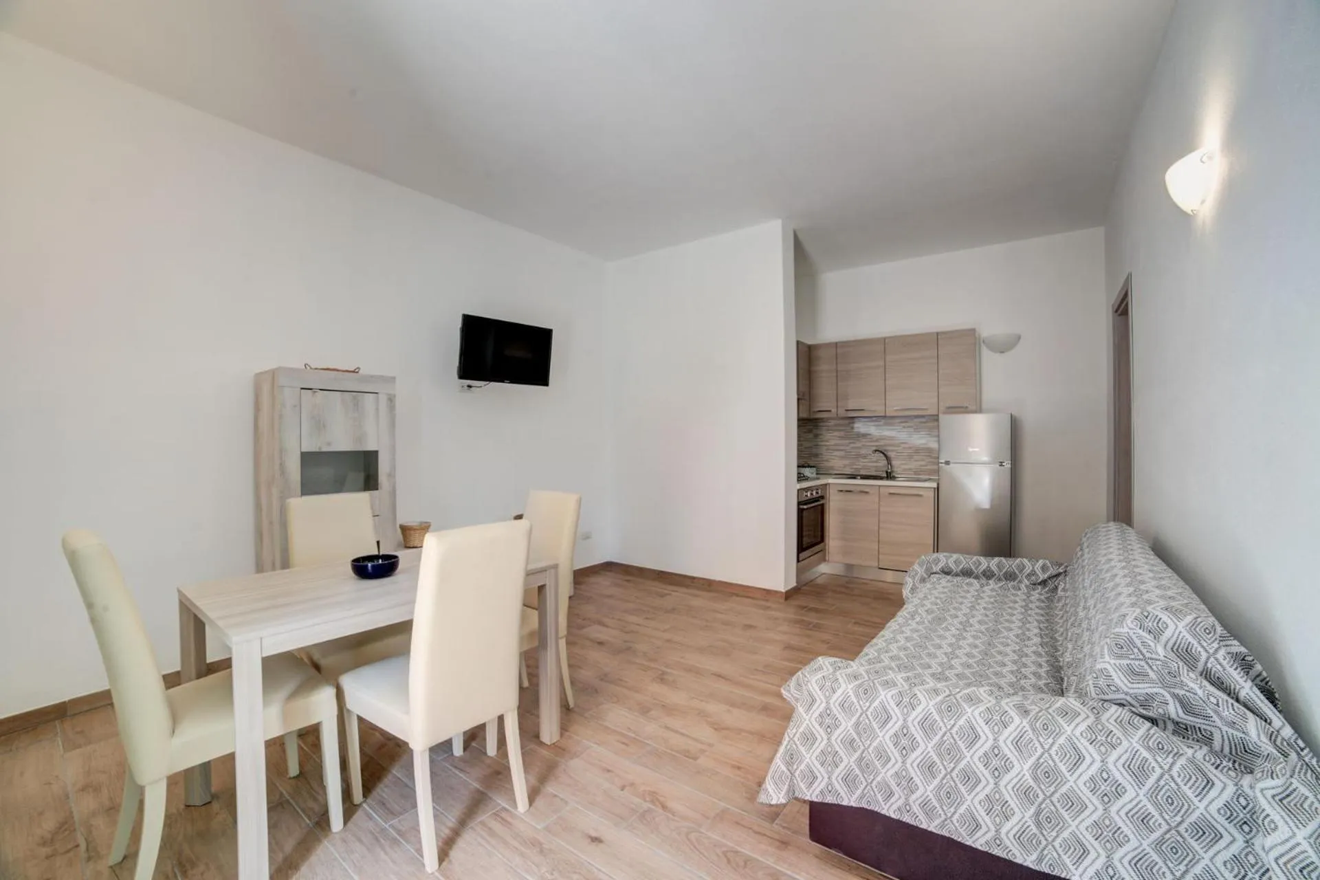 Dining area, Bed in Olbia Domus Inn
