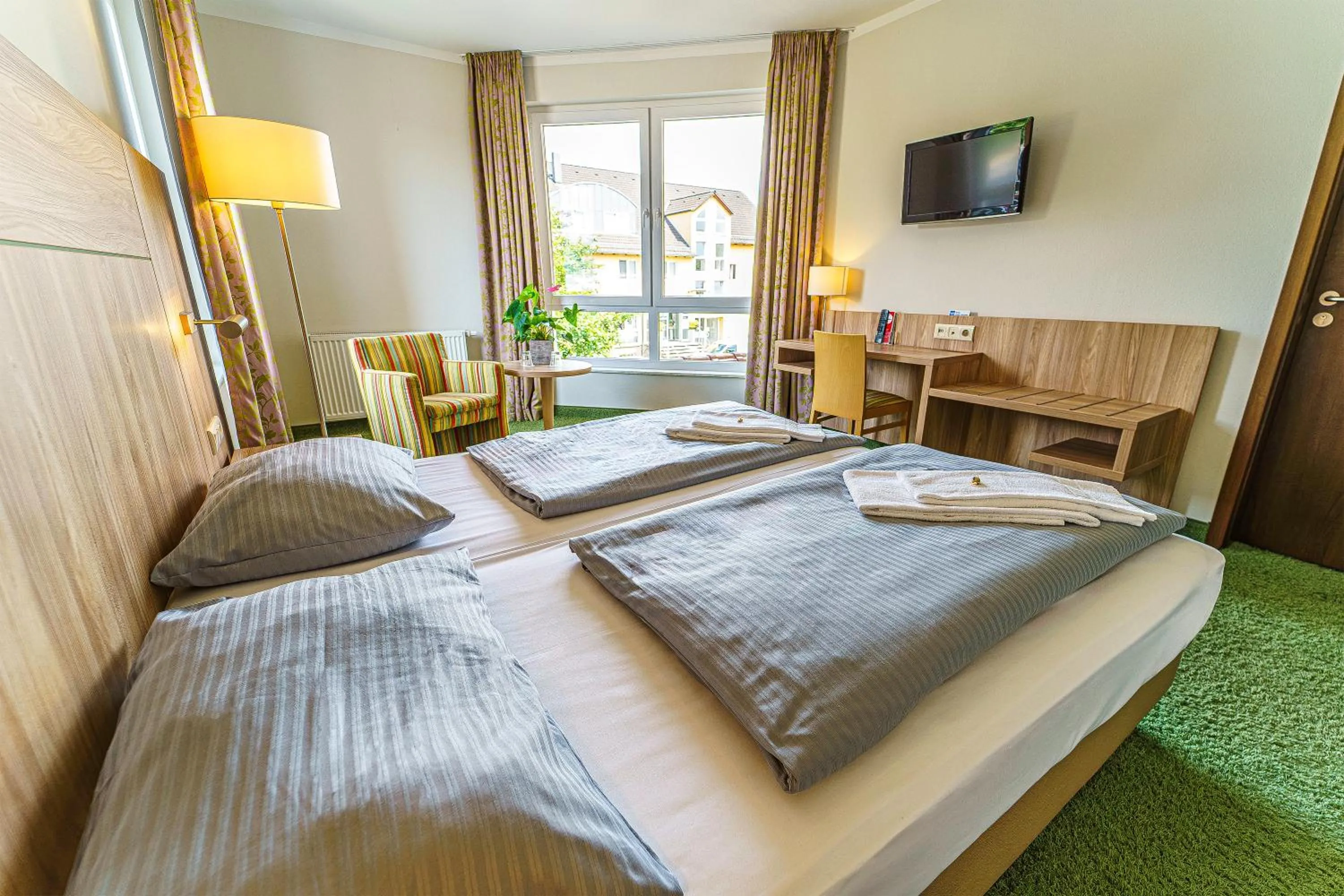 Bed in Einklang - Dein Hotel am Südhorn