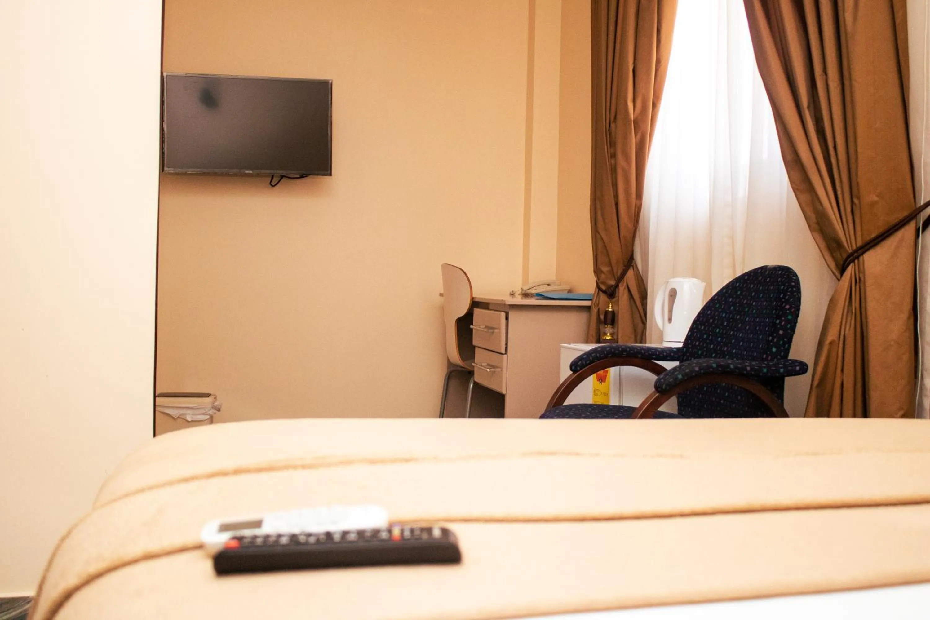 Bedroom in Exotic Palace Hotel