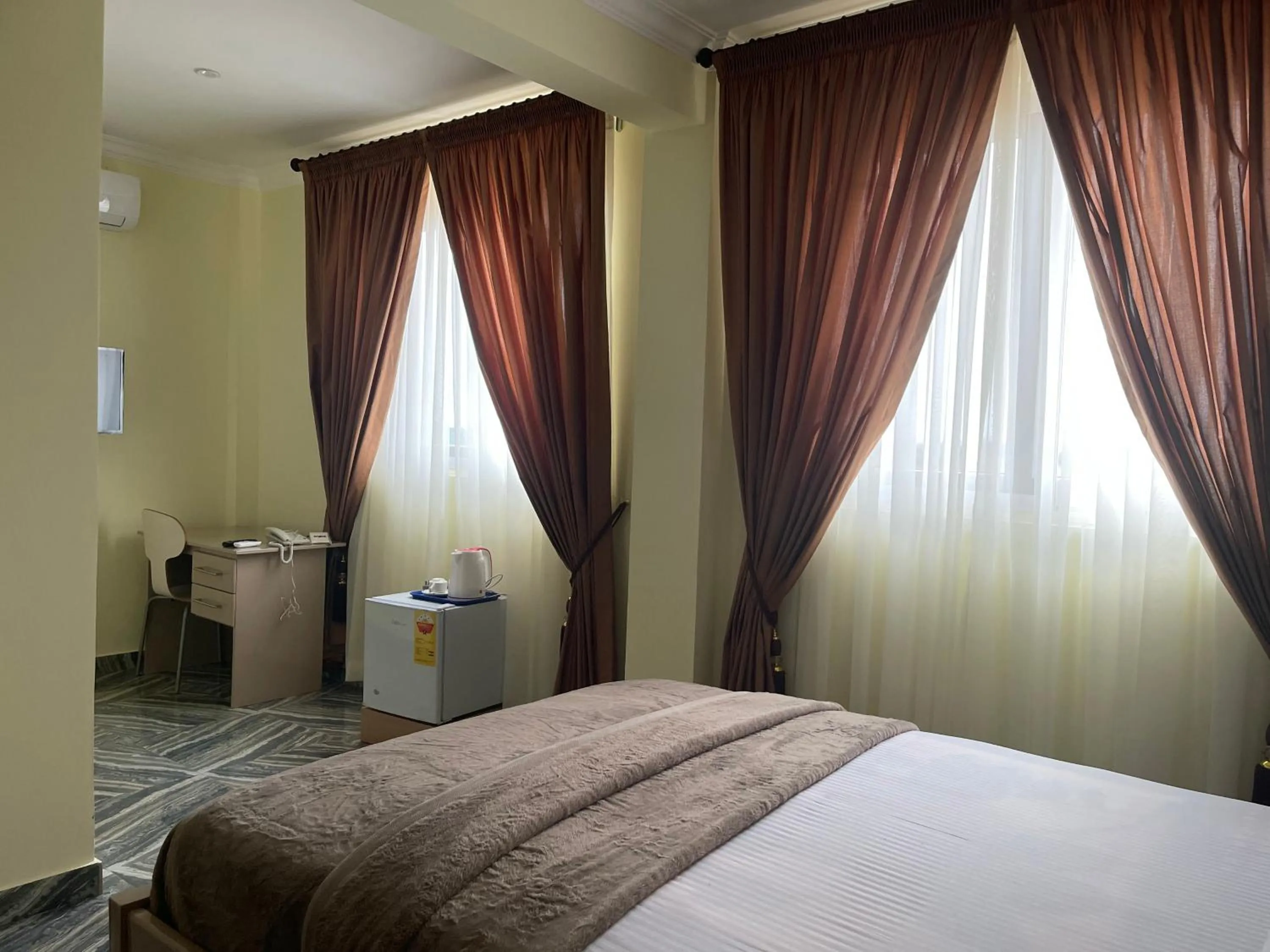 Bed in Exotic Palace Hotel