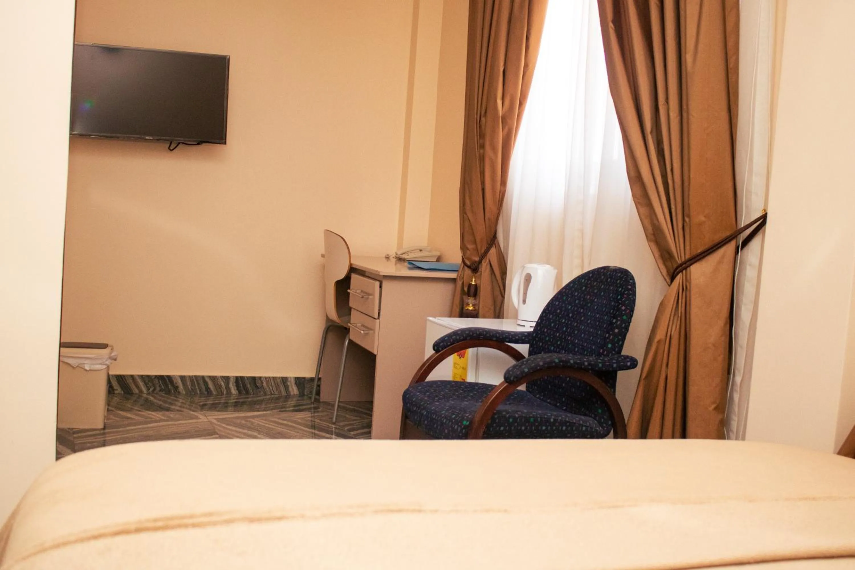 Bed in Exotic Palace Hotel