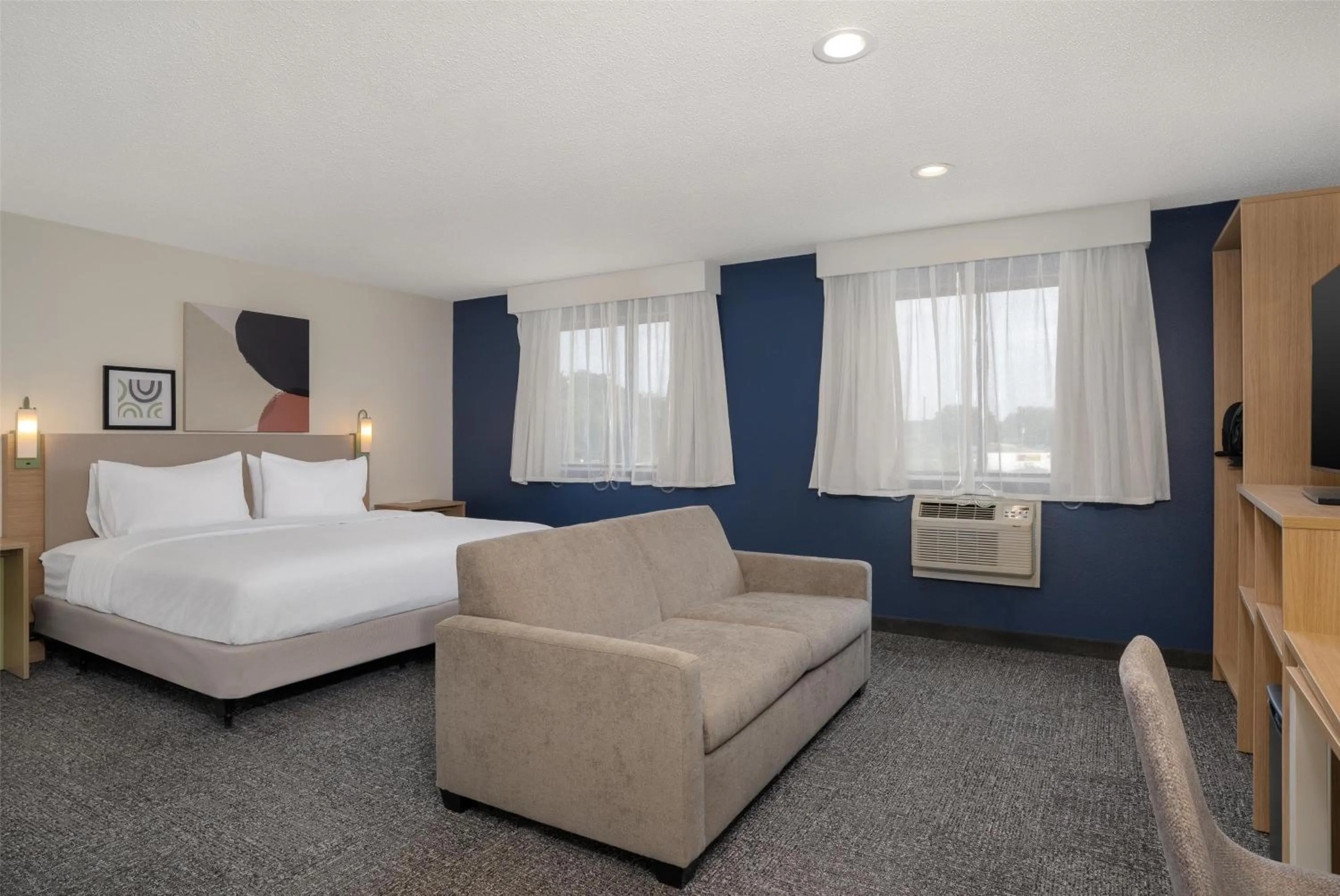 Living room, Bed in Spark by Hilton Carlisle South