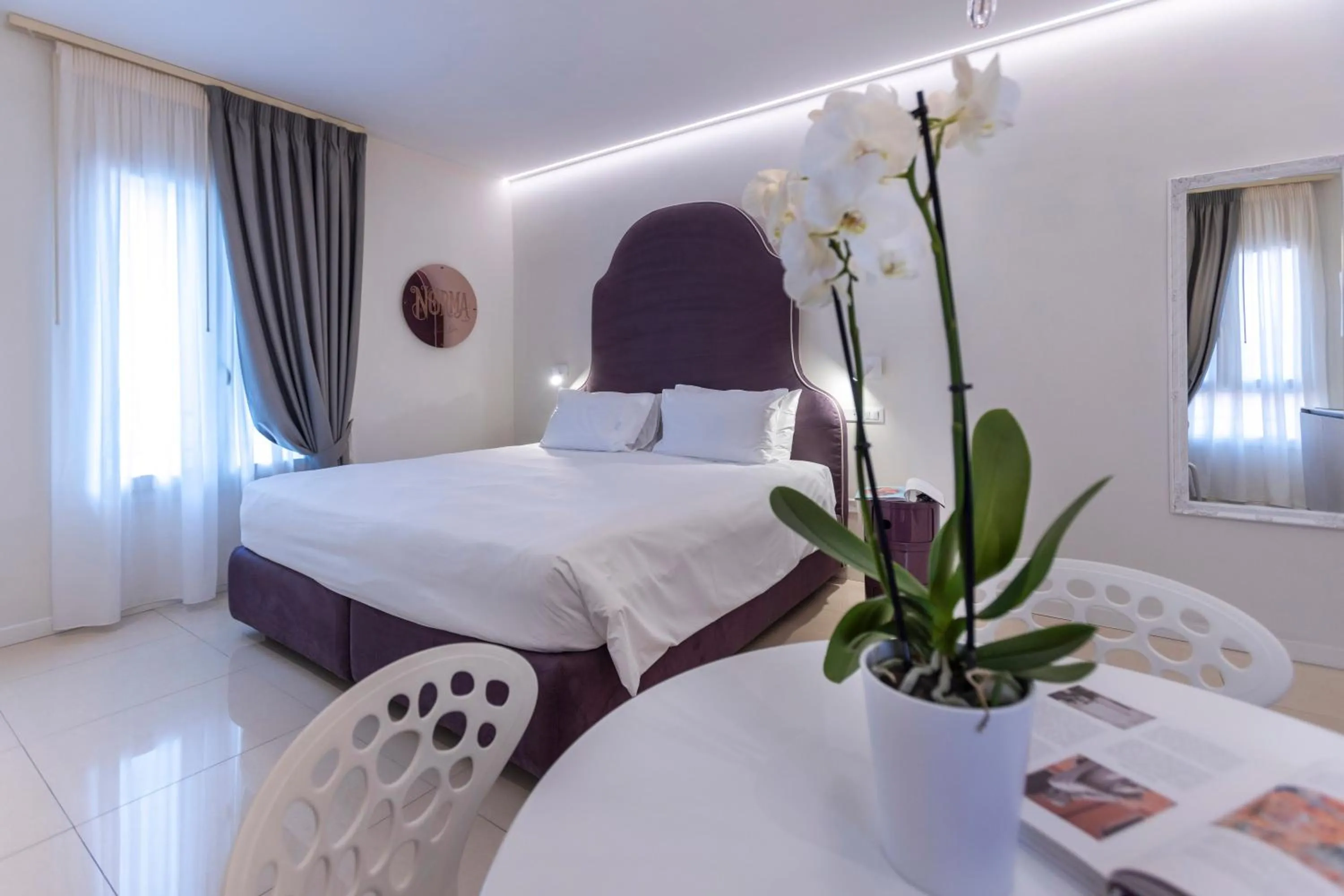 Photo of the whole room, Bed in Opera Relais De Charme - Aparthotel