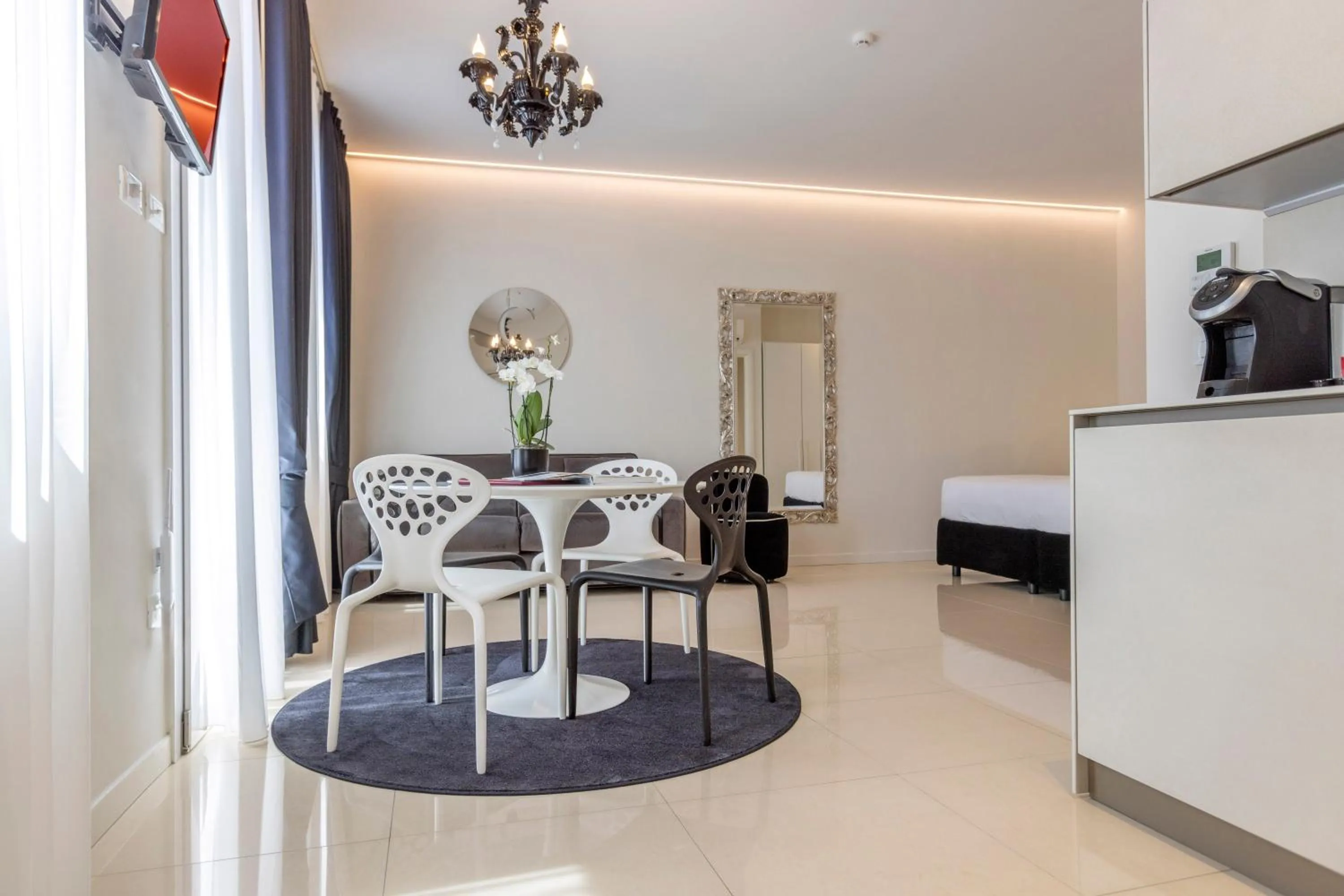 Photo of the whole room in Opera Relais De Charme - Aparthotel