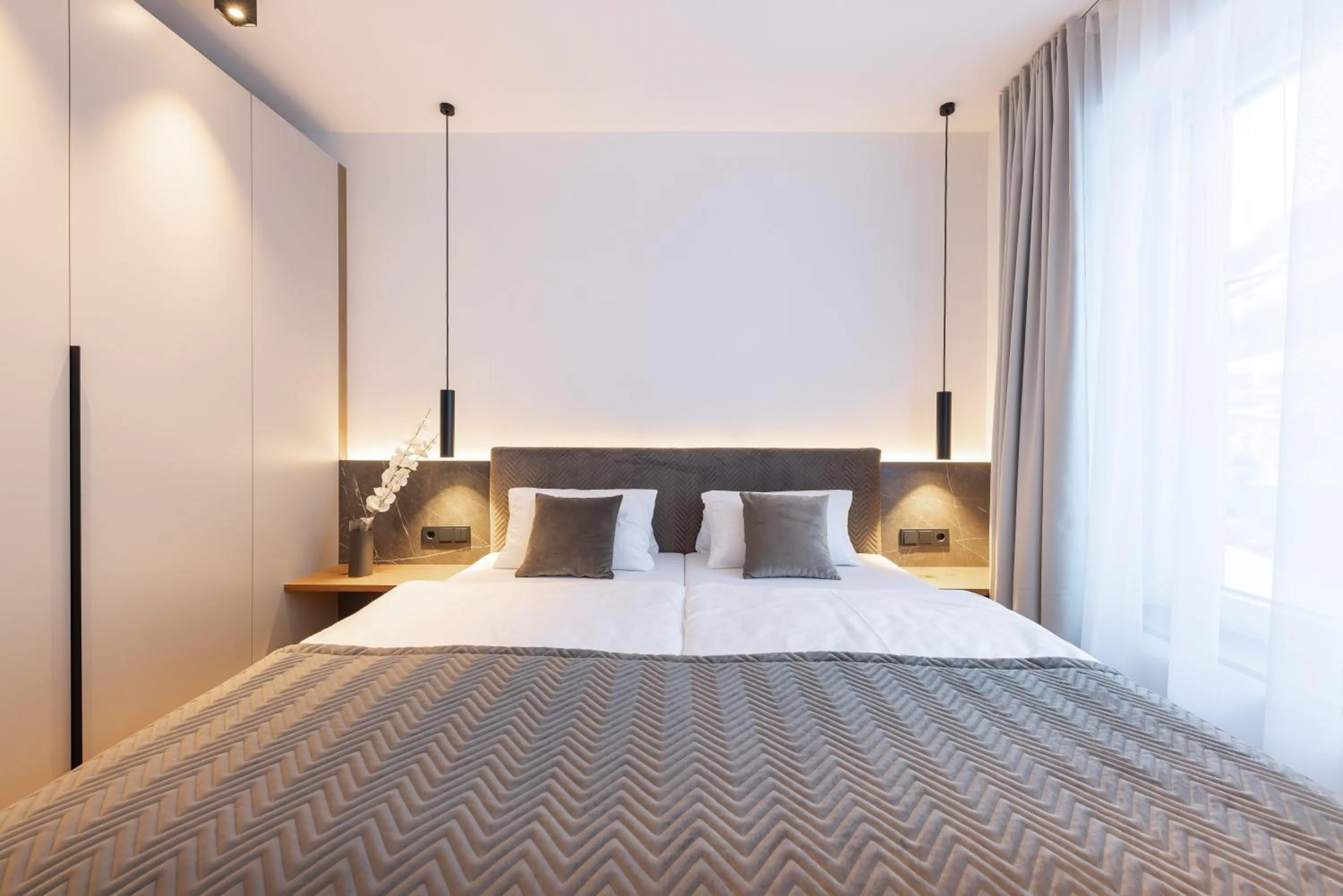 Bed in Max Mountain Apartments