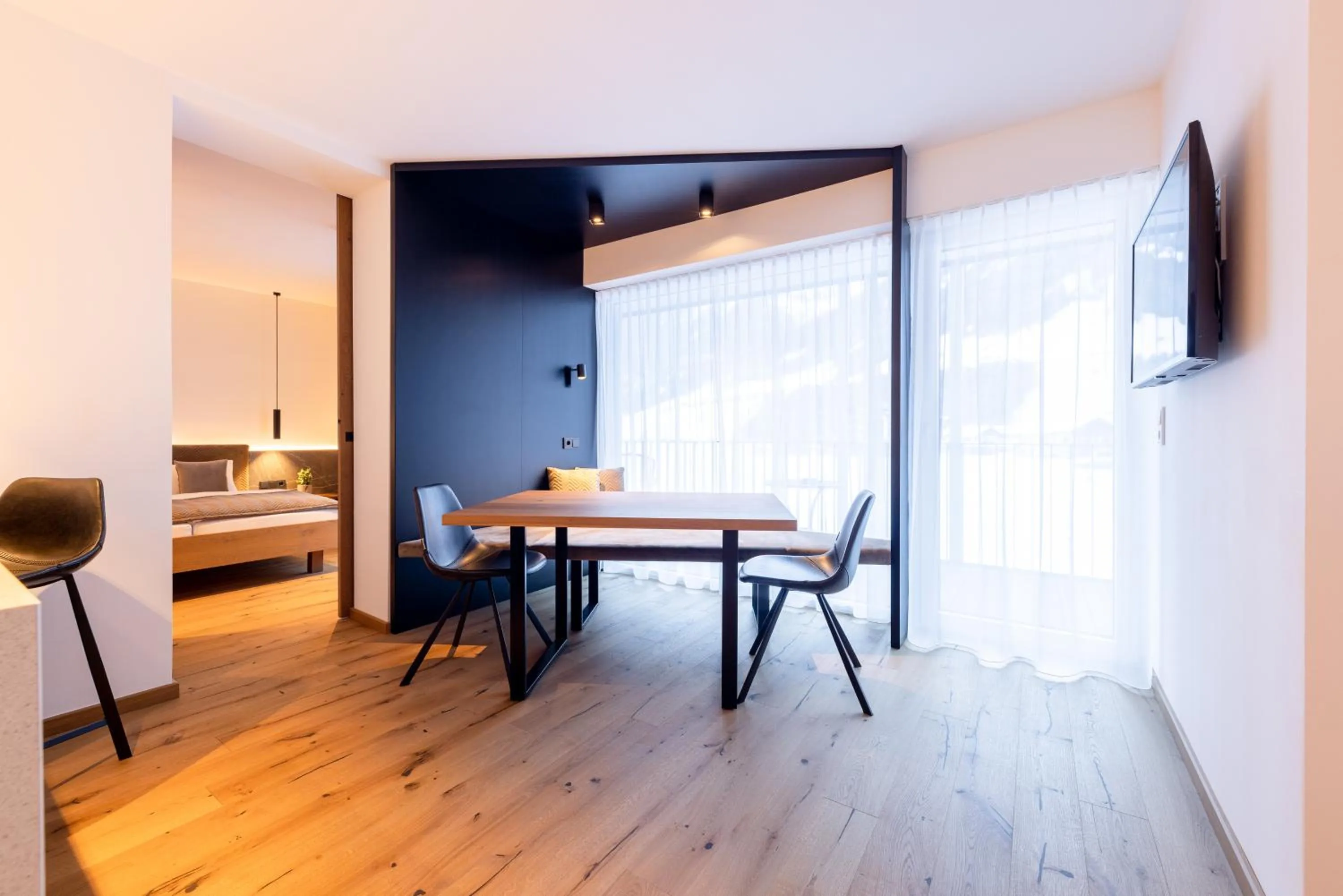 Living room, Bed in Max Mountain Apartments