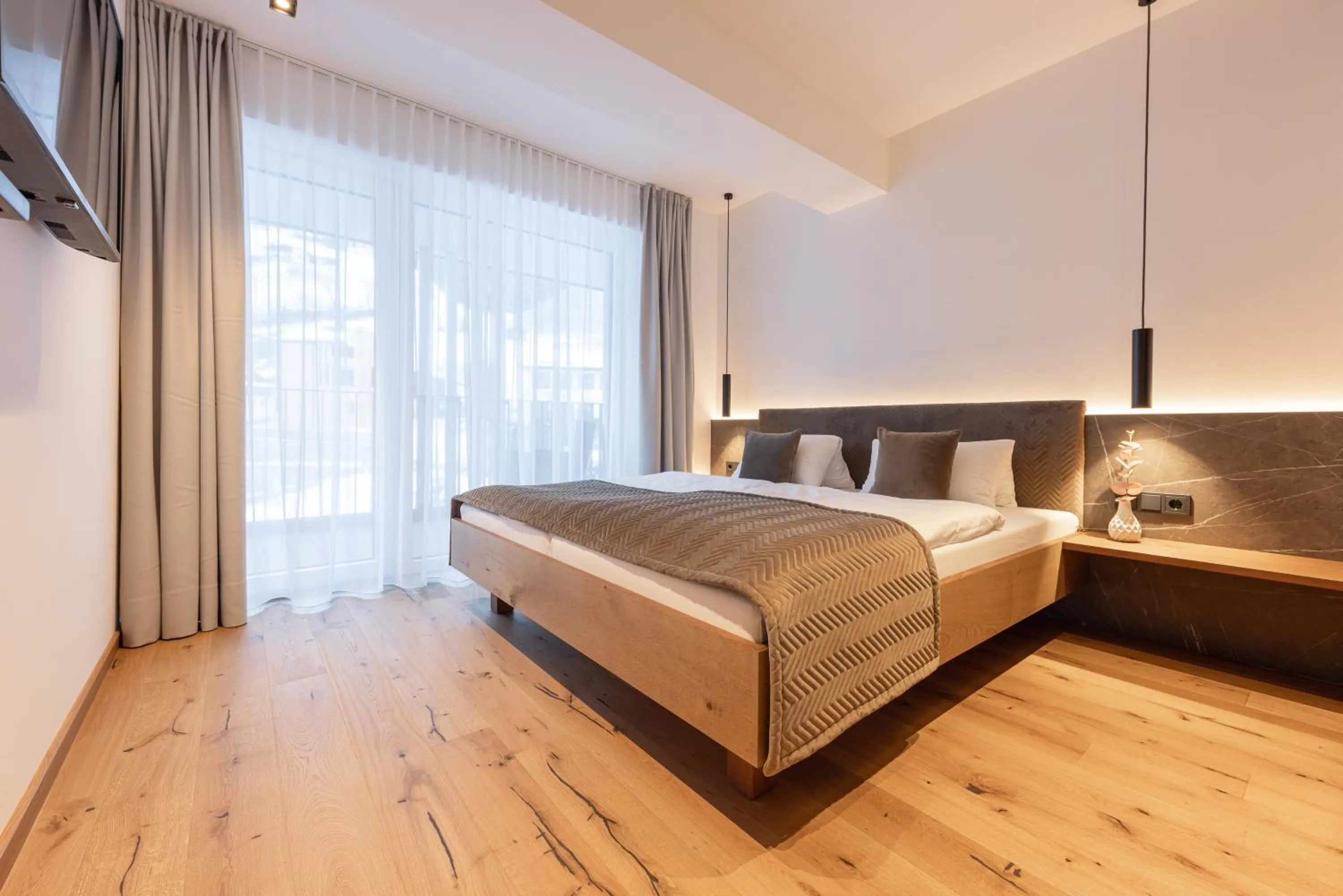 Bed in Max Mountain Apartments