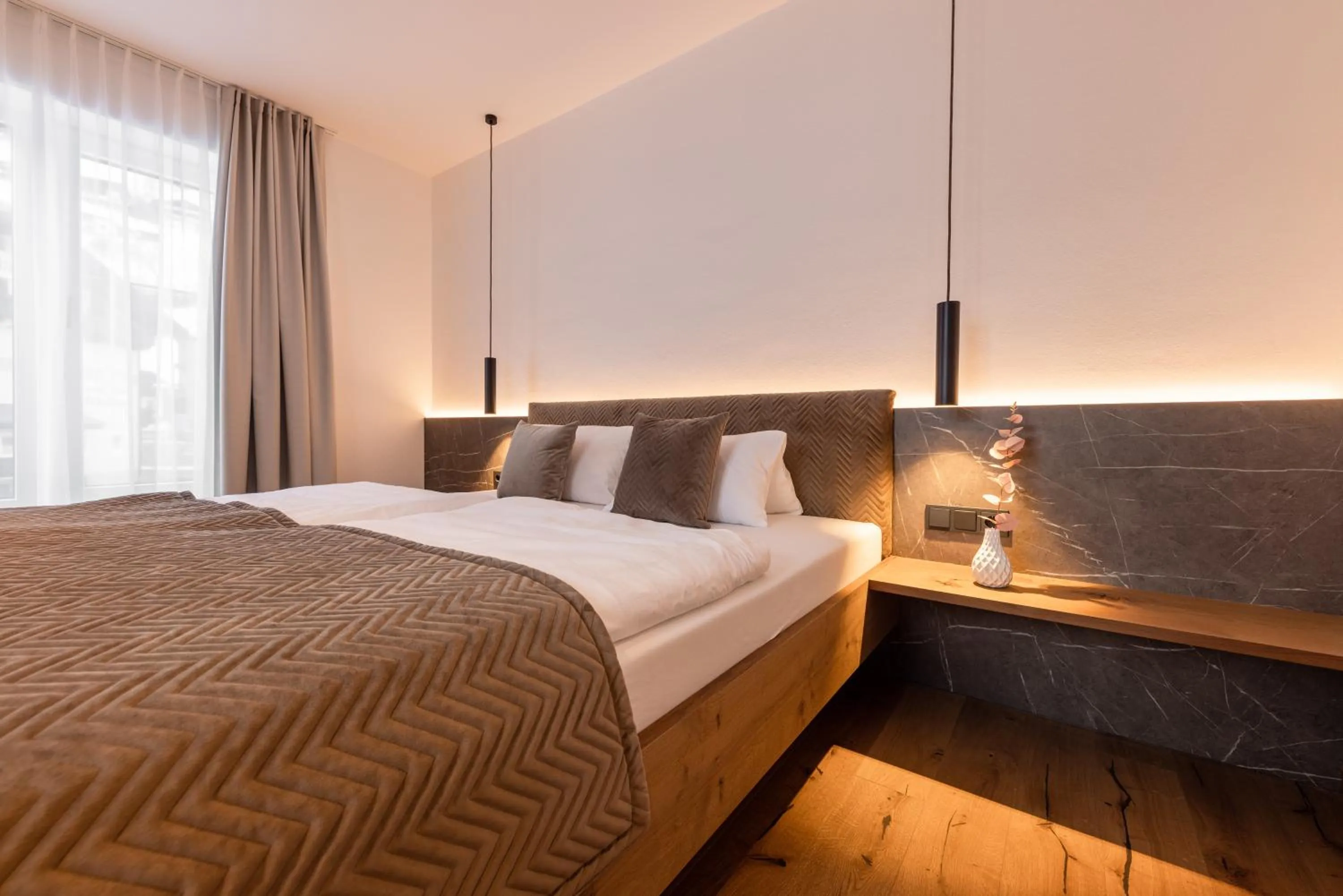 Bed in Max Mountain Apartments