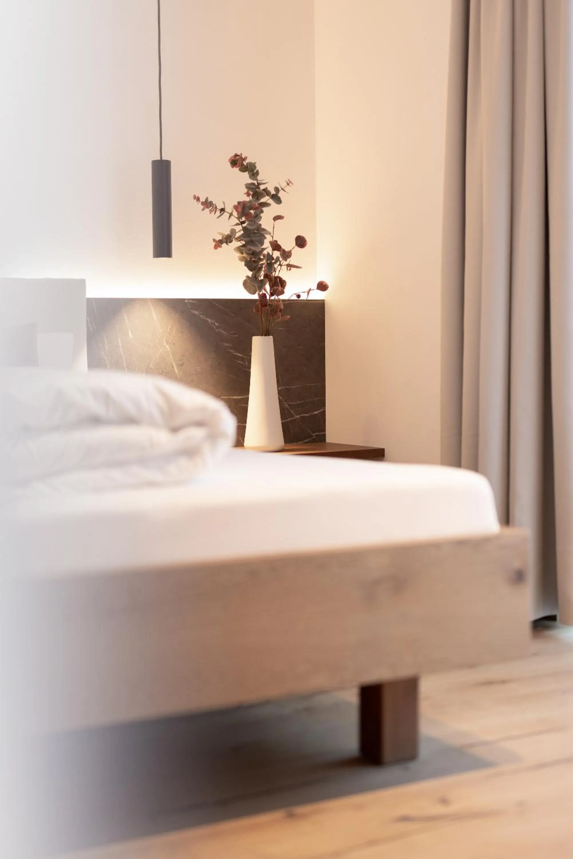 Bed in Max Mountain Apartments