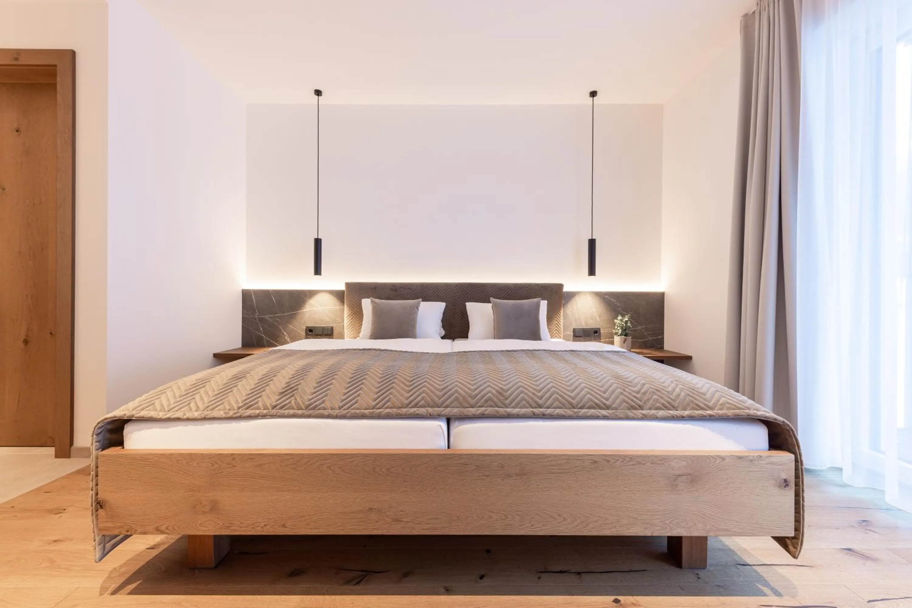 Bed in Max Mountain Apartments