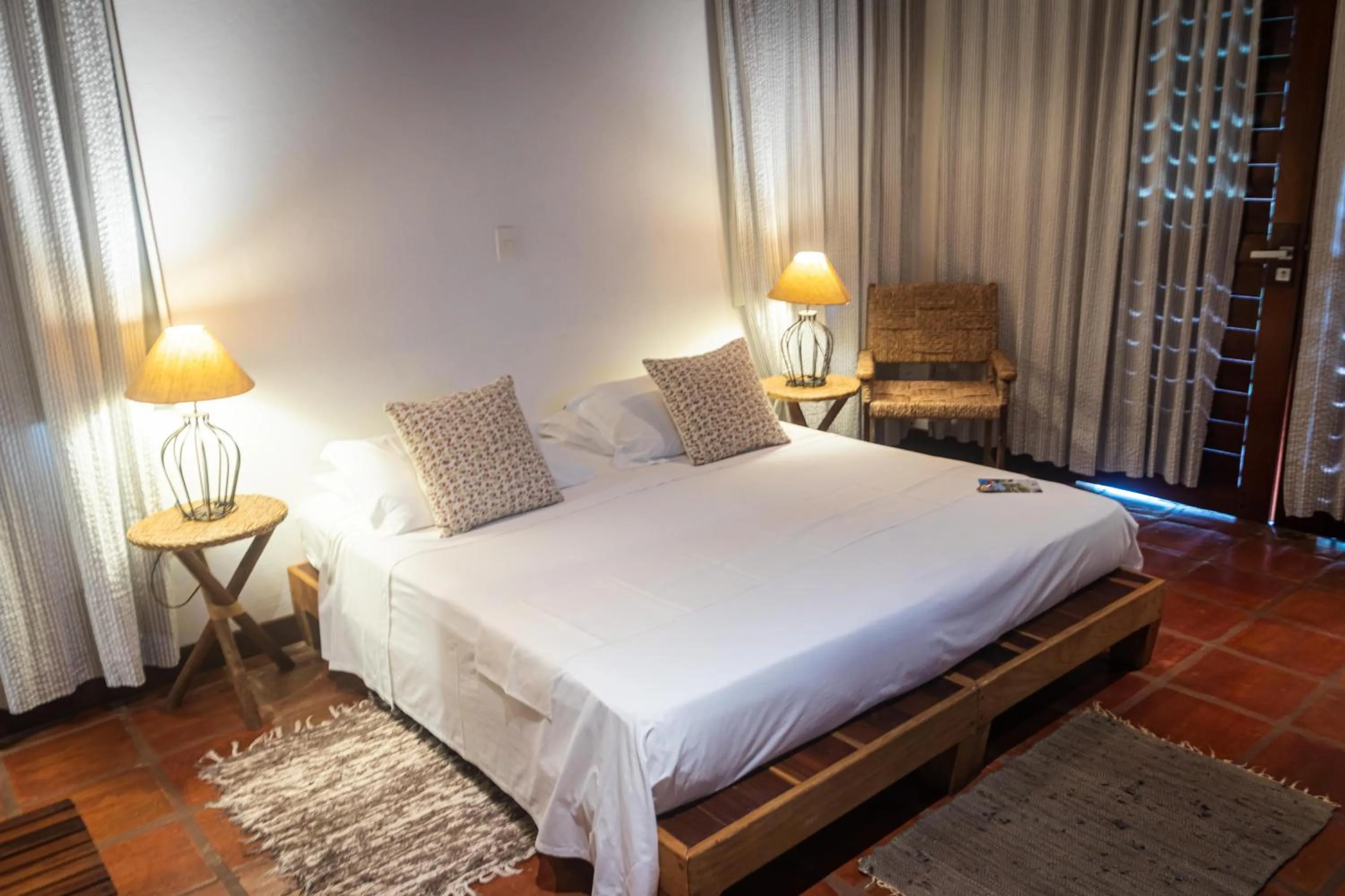 Bed in Hotel Villaggio Tudo Bom