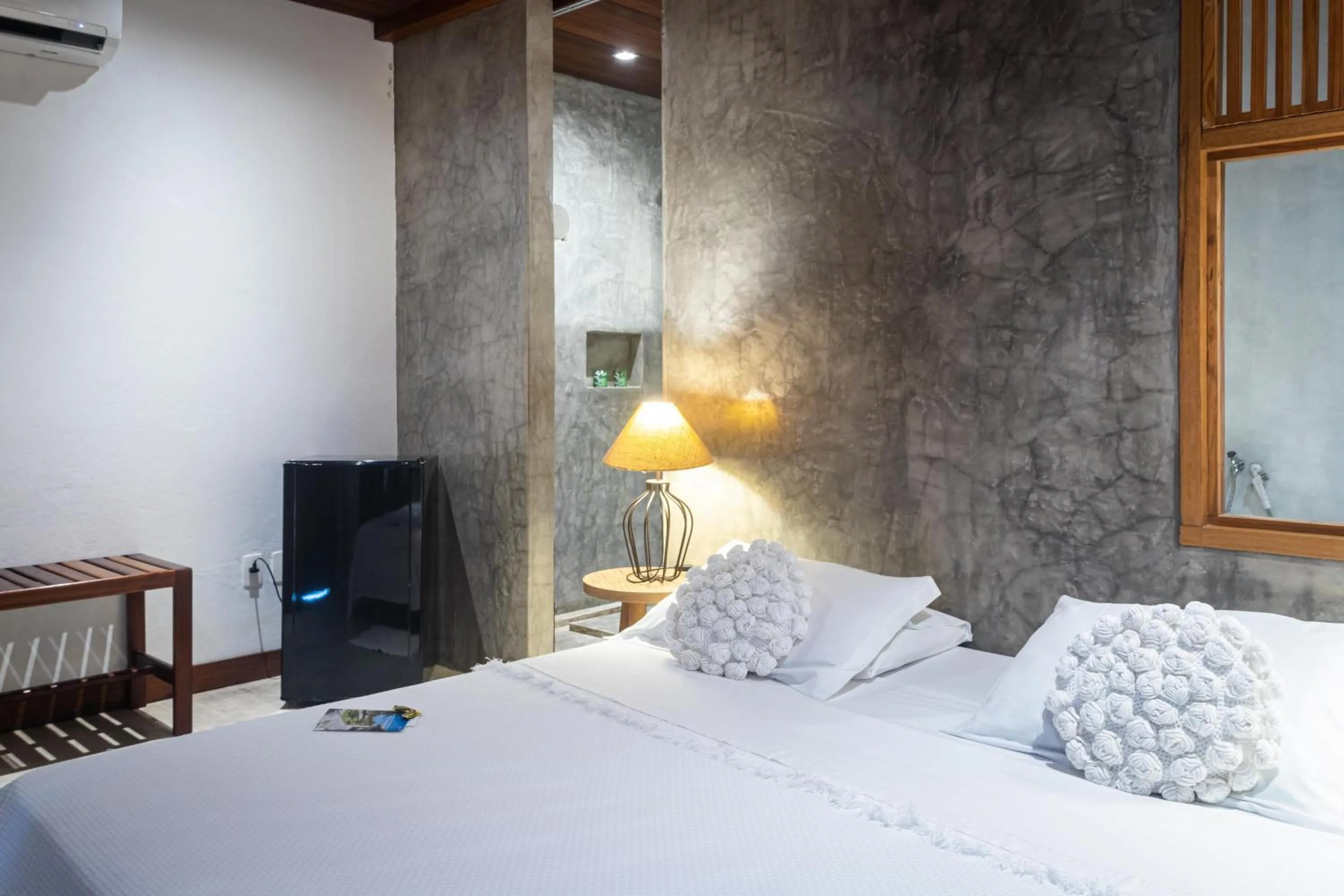 Bed in Hotel Villaggio Tudo Bom