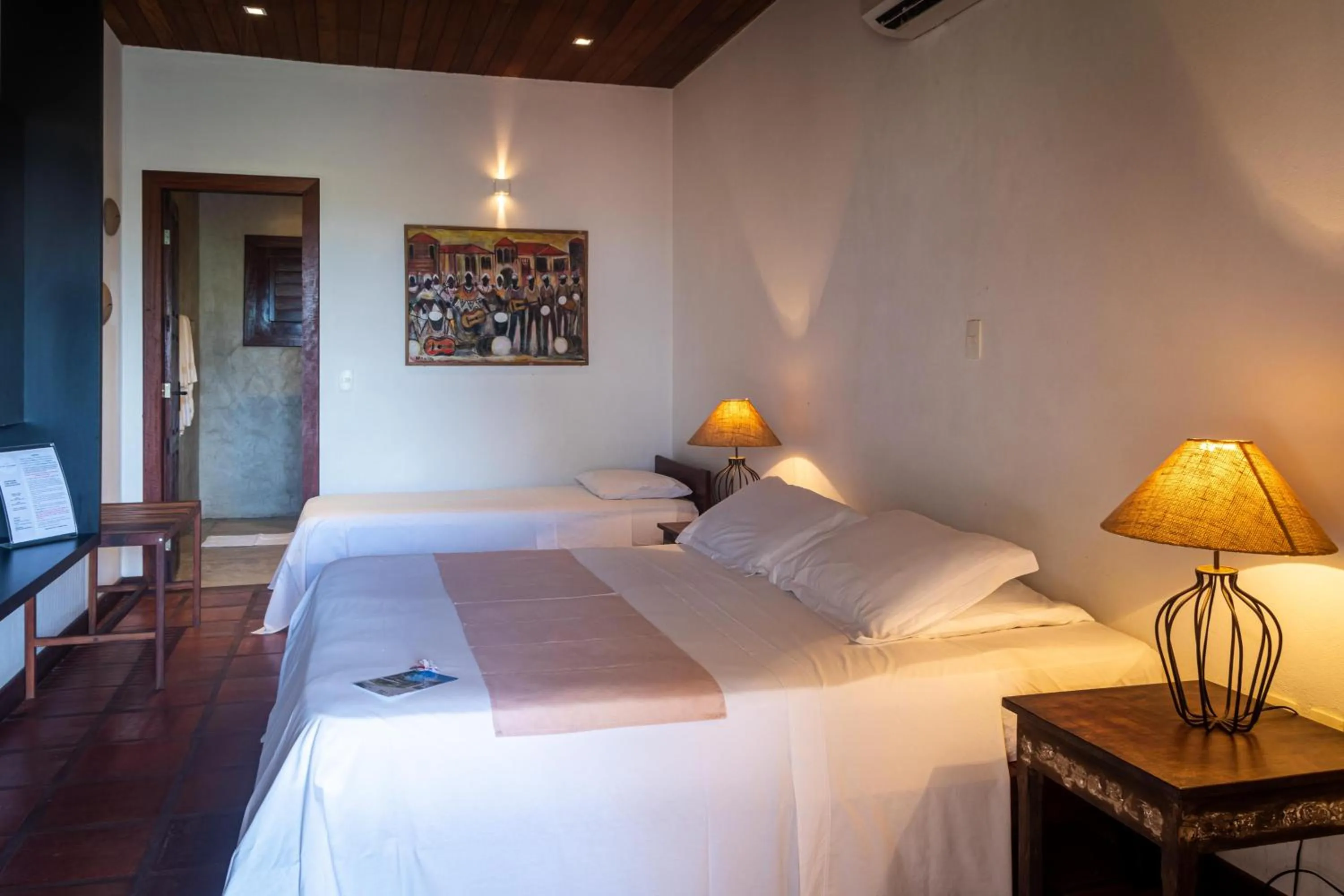 Bed in Hotel Villaggio Tudo Bom