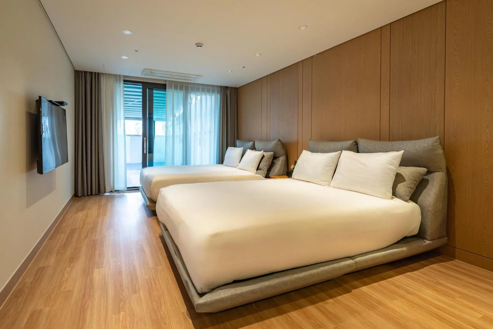 Bedroom, Bed in Jeju Attirance Hotel & poolvilla