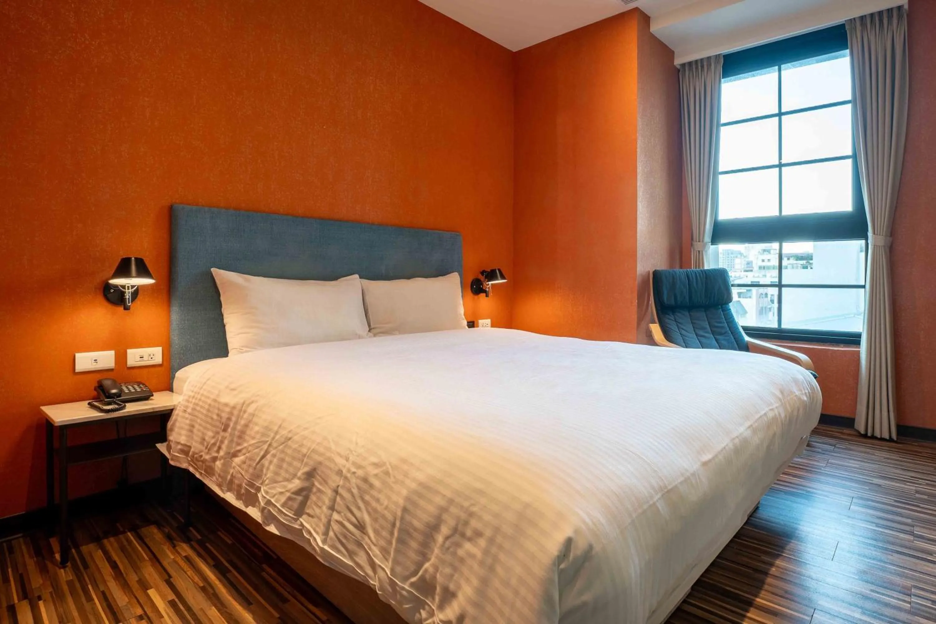 Bed in CHECK inn Taichung Ziyou