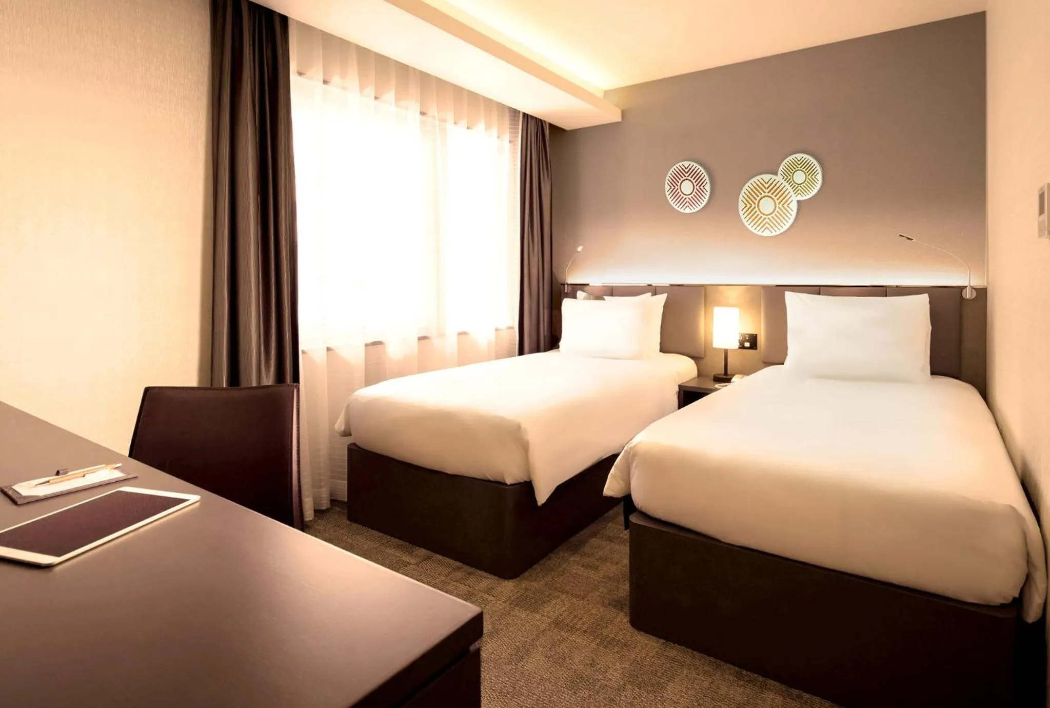Photo of the whole room, Bed in Holiday Inn & Suites Shin Osaka by IHG