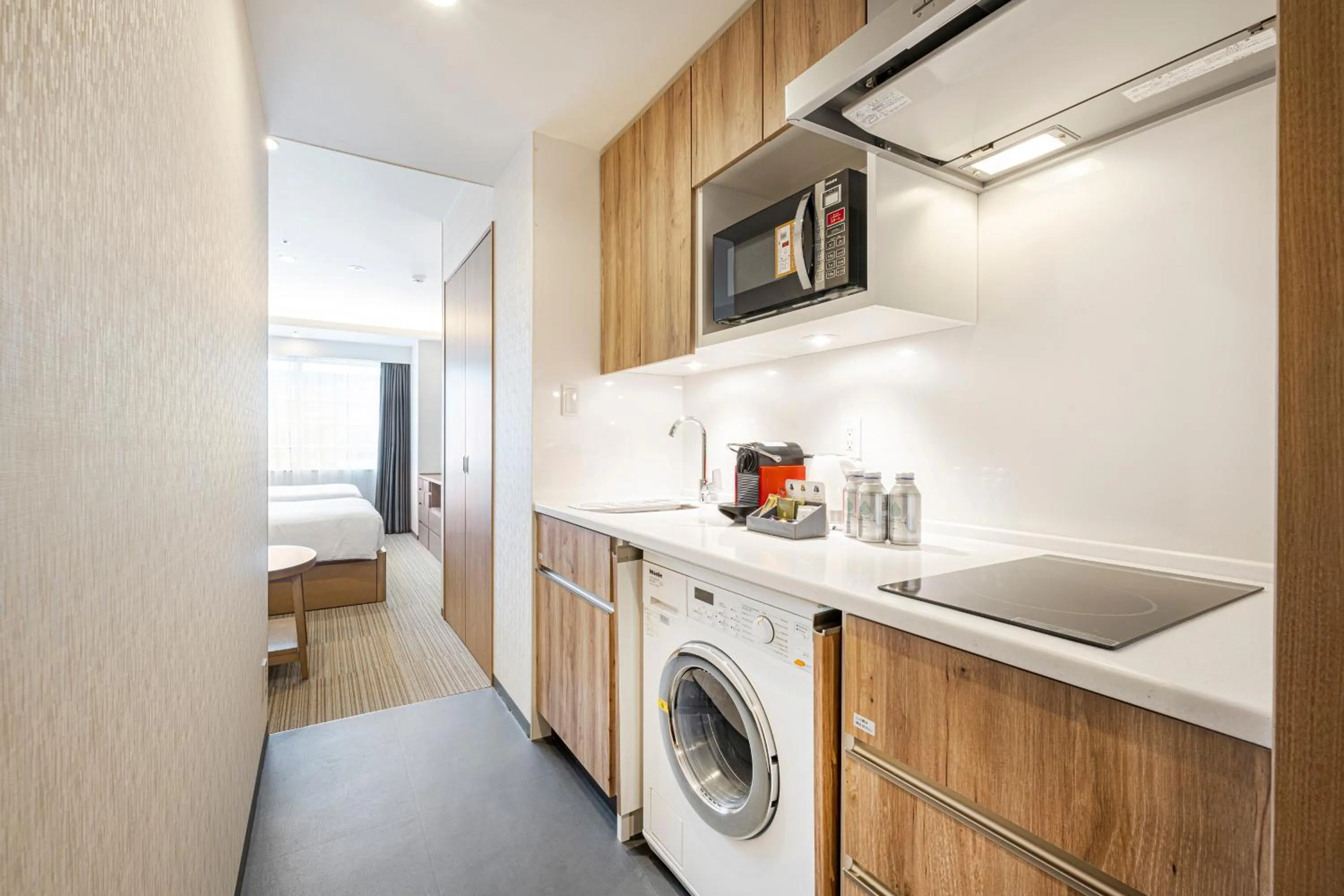 kitchen in Holiday Inn & Suites Shin Osaka by IHG