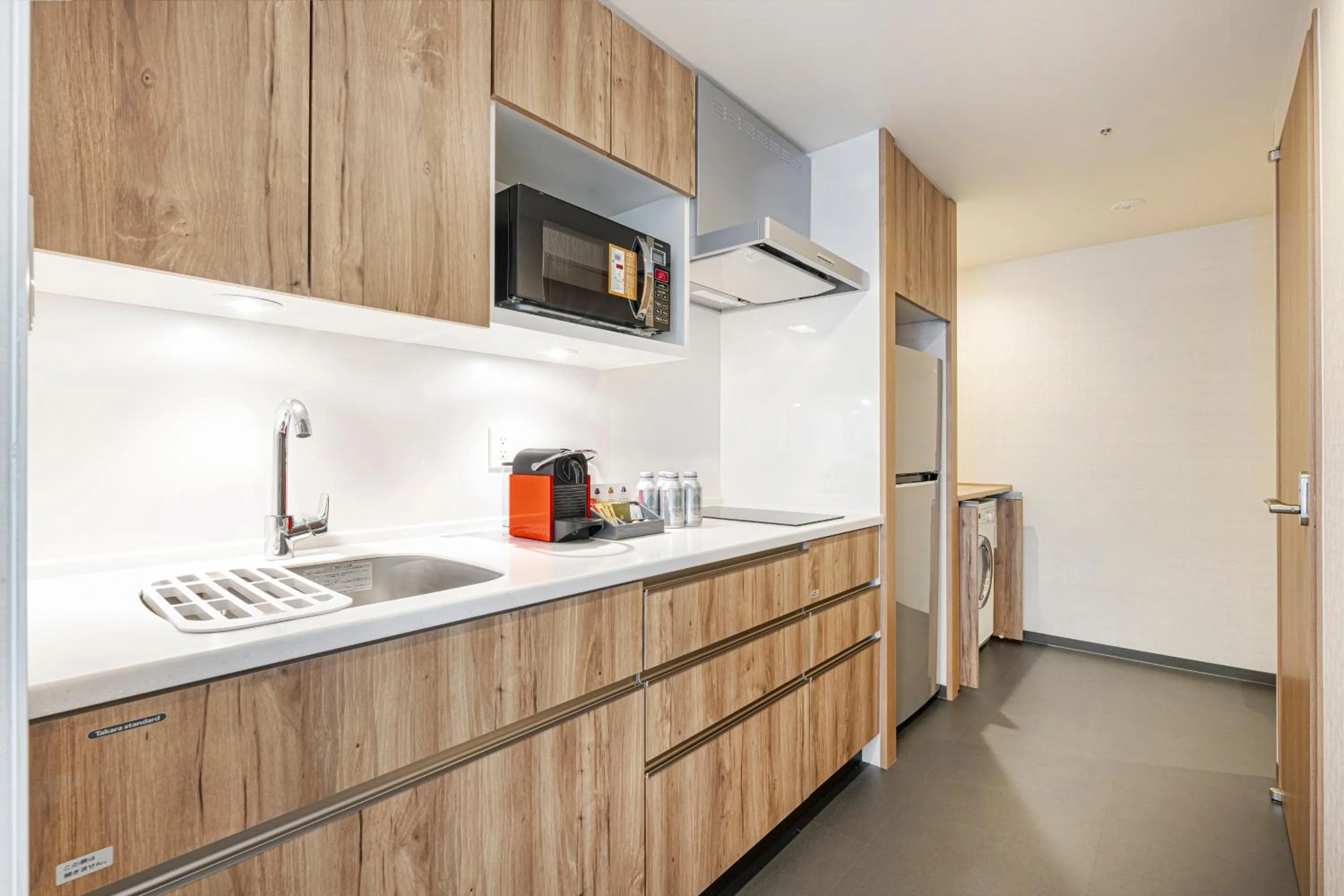 kitchen in Holiday Inn & Suites Shin Osaka by IHG