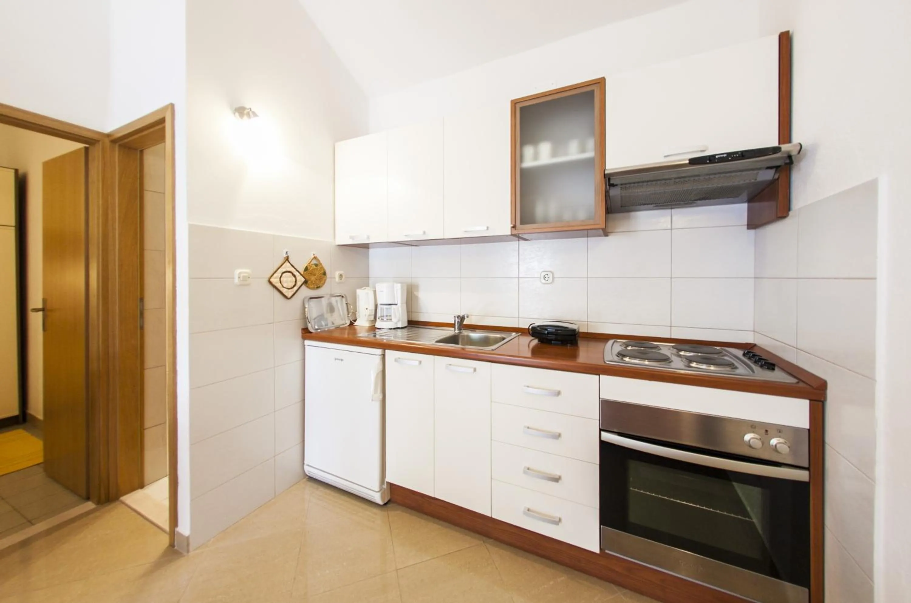 Kitchen or kitchenette in Apartments Magdalena