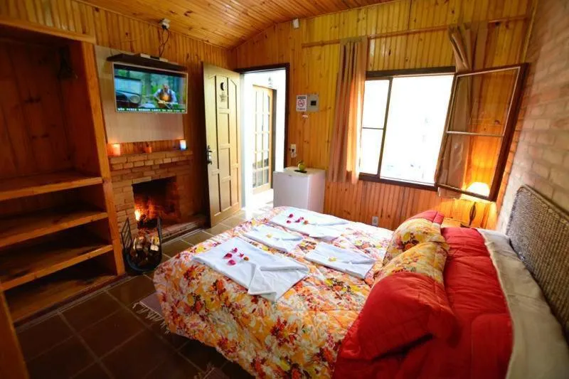 Bed in Pousada Aconchego