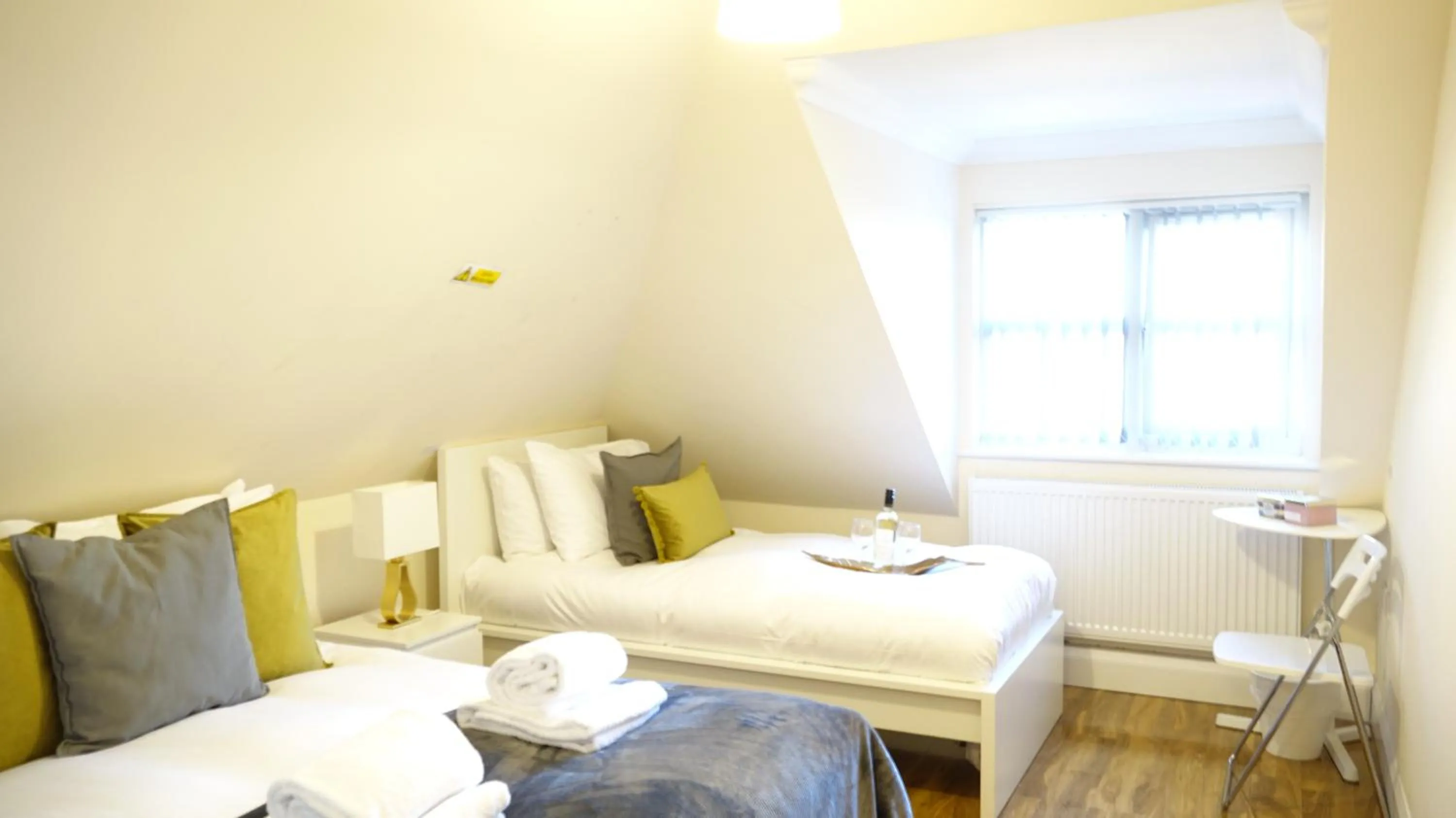 Bedroom in RC Airport Rooms