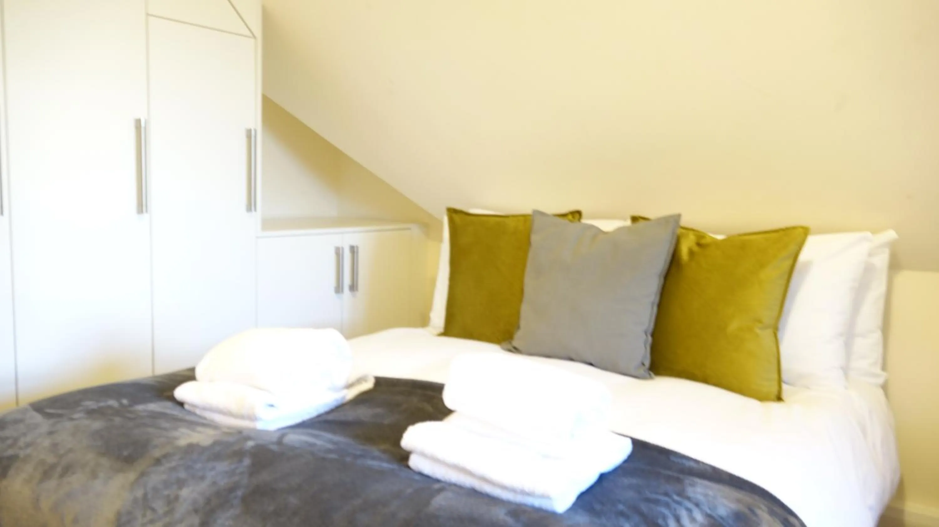 Bedroom in RC Airport Rooms