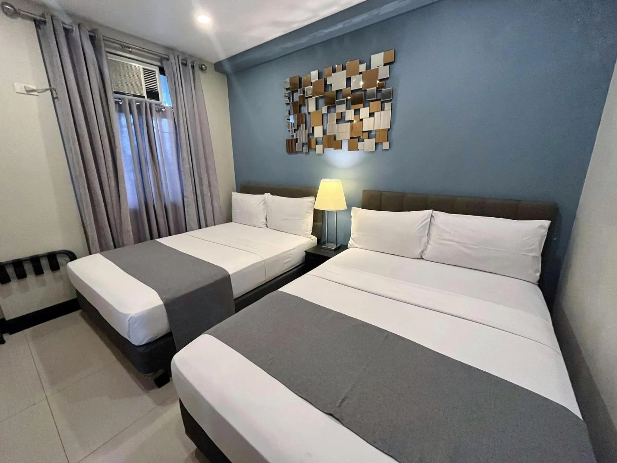 Bedroom, Bed in Artemis Place Makati Hotel