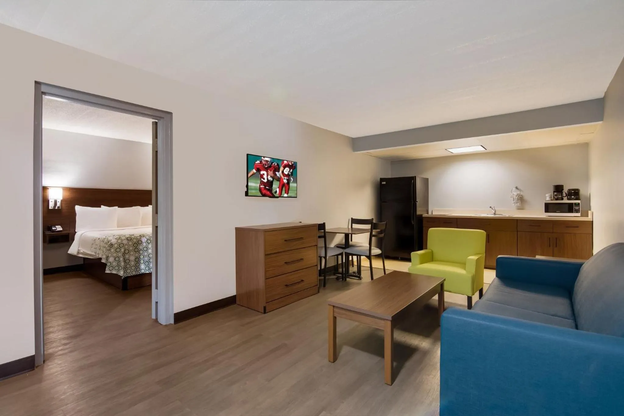 Bedroom, Bed in HomeTowne Studios by Red Roof Vero Beach - I-95