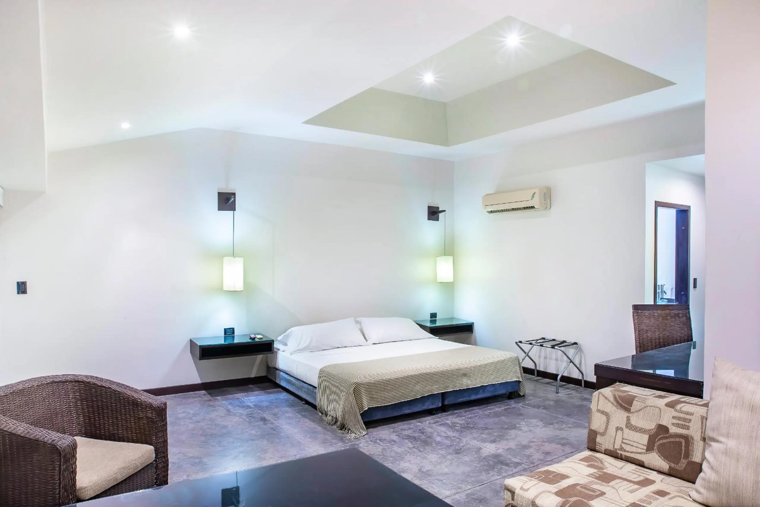 Photo of the whole room, Bed in Hotel Santorini Express y Cabañas