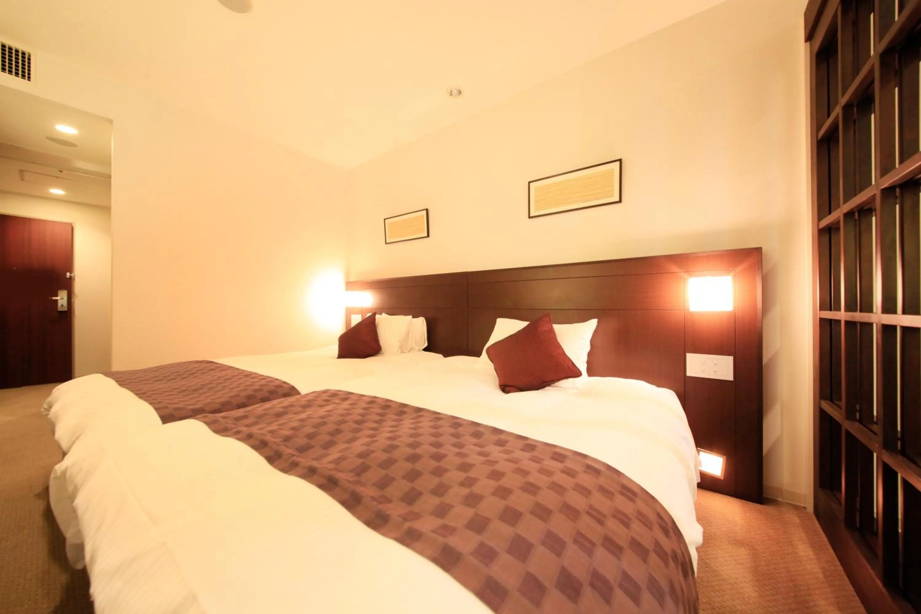 Photo of the whole room, Bed in Quintessa Hotel Sasebo