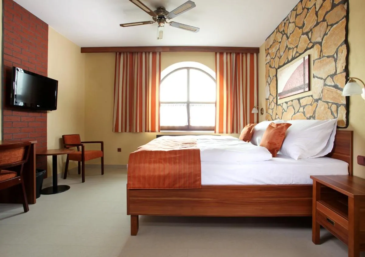Bed in Hotel Vinopa