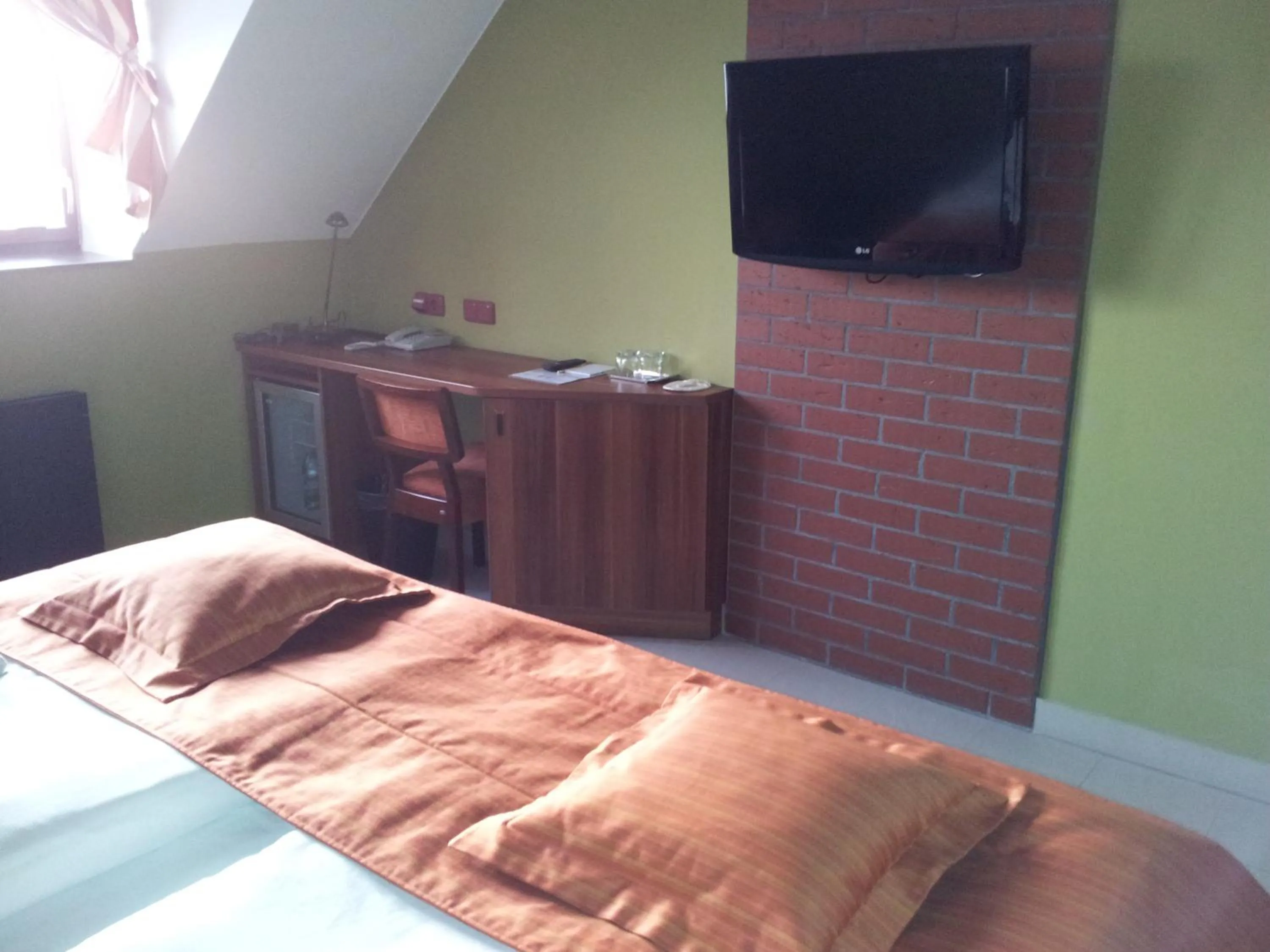 Bed in Hotel Vinopa